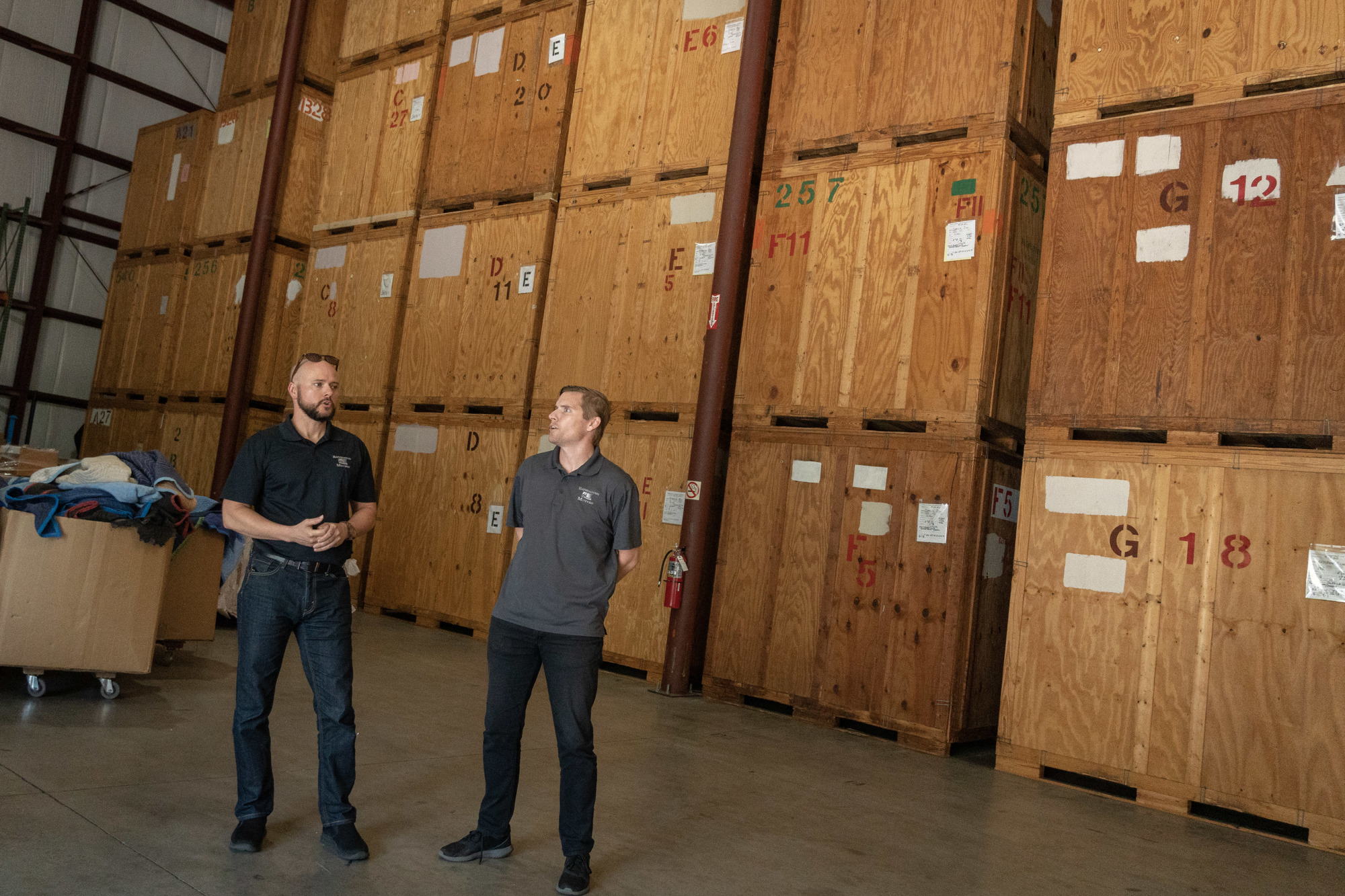 Brothers Chris and Michael McCreary  inside their company's warehouse. (Photo by Jason Pratt)