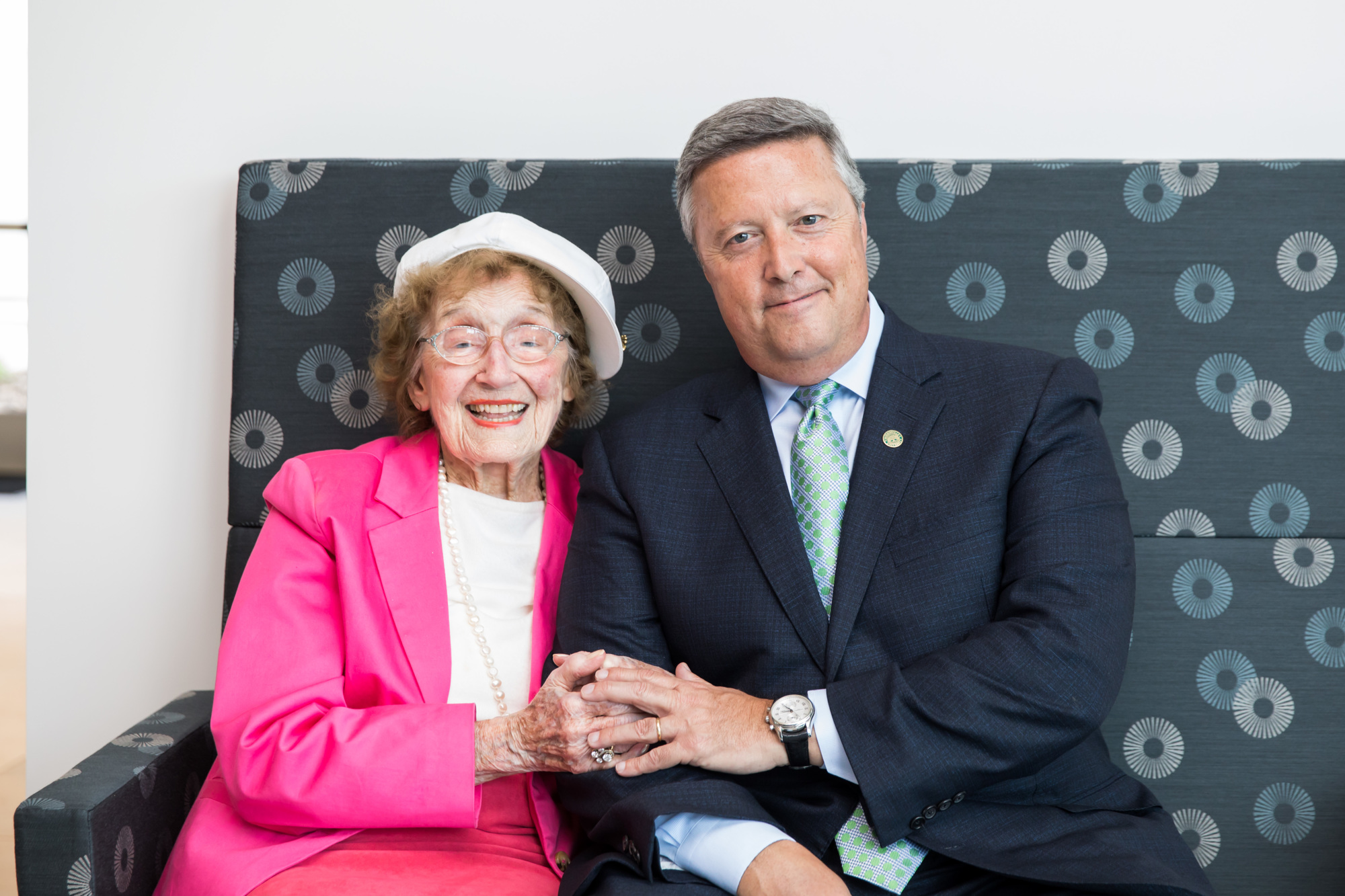 Fran Kinne and JU President Tim Cost at the Frances Bartlett Kinne Welcome Gallery in the university’s Frisch Welcome Center in 2018. Cost, a graduate of JU, was handed his diploma by Kinne in 1981.