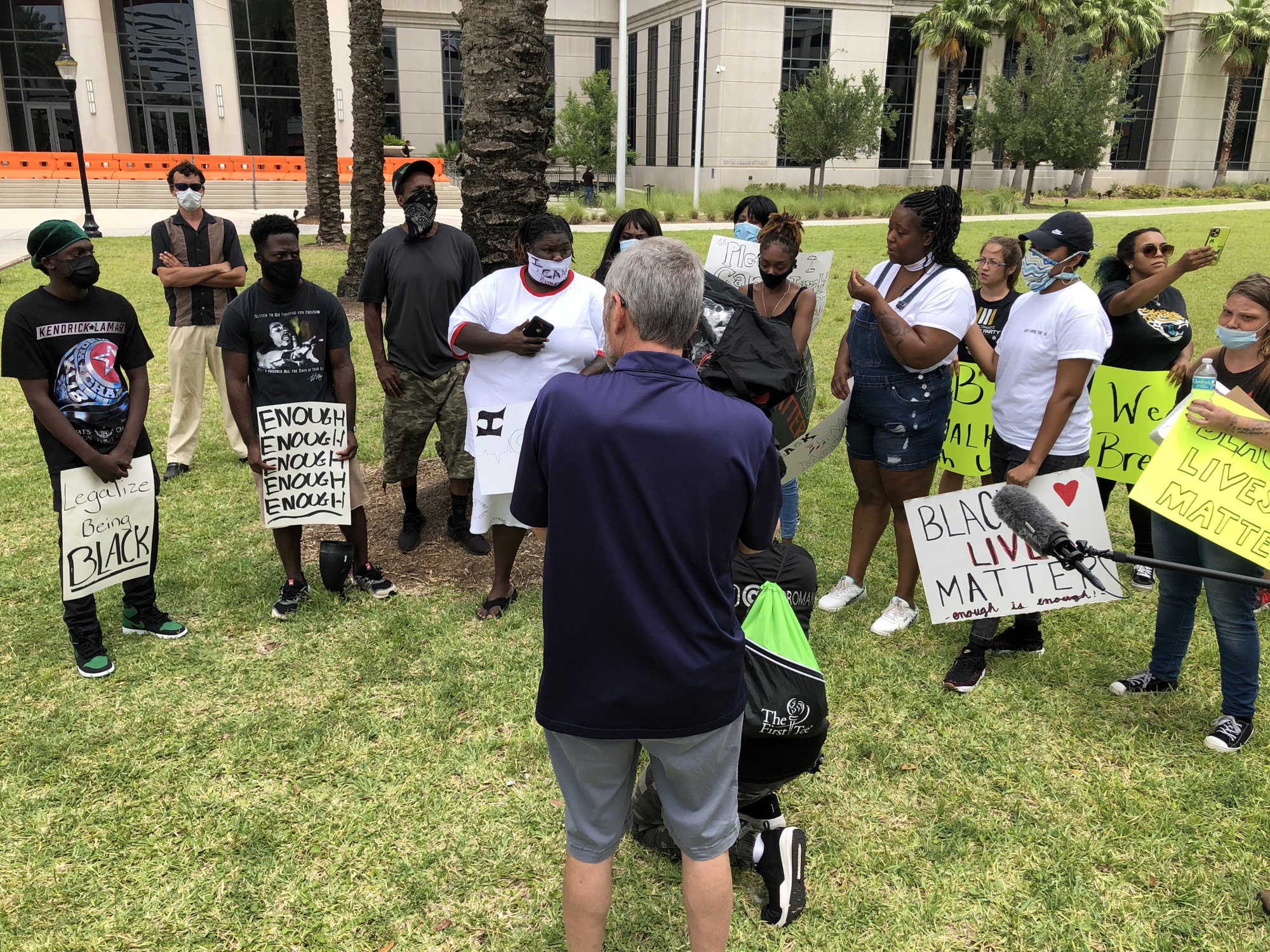 About 50 protestors gathered at noon on the steps of the Duval County Courthouse. (Mike Mendenhall)