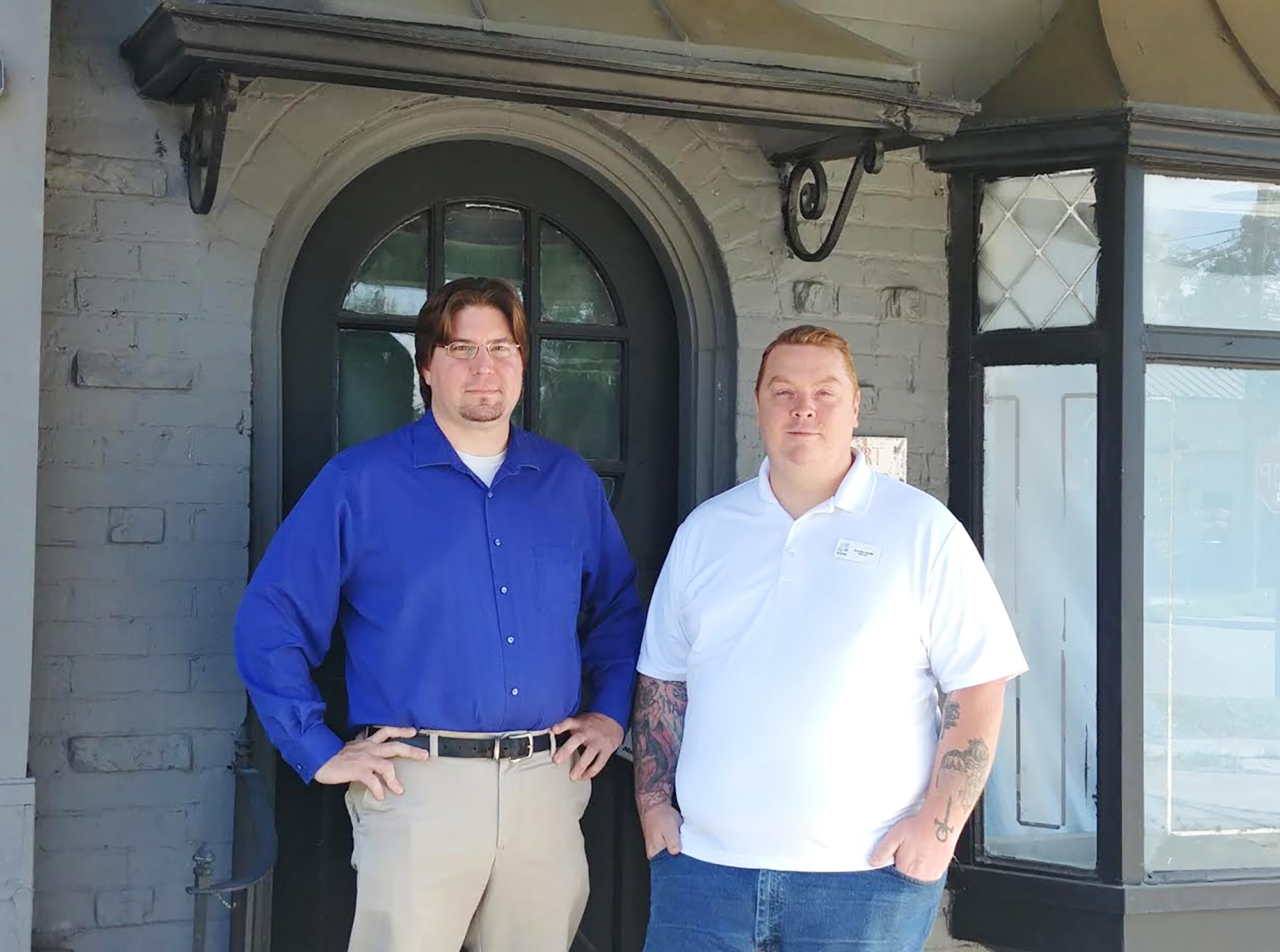Andrew Suslak and Brandon Merkle, the owners of Post Modern Brewing, stand in the doorway of the former Pure Oil Co. gas station at 2951 Post St. that they plan to renovate into a brewery and taproom.