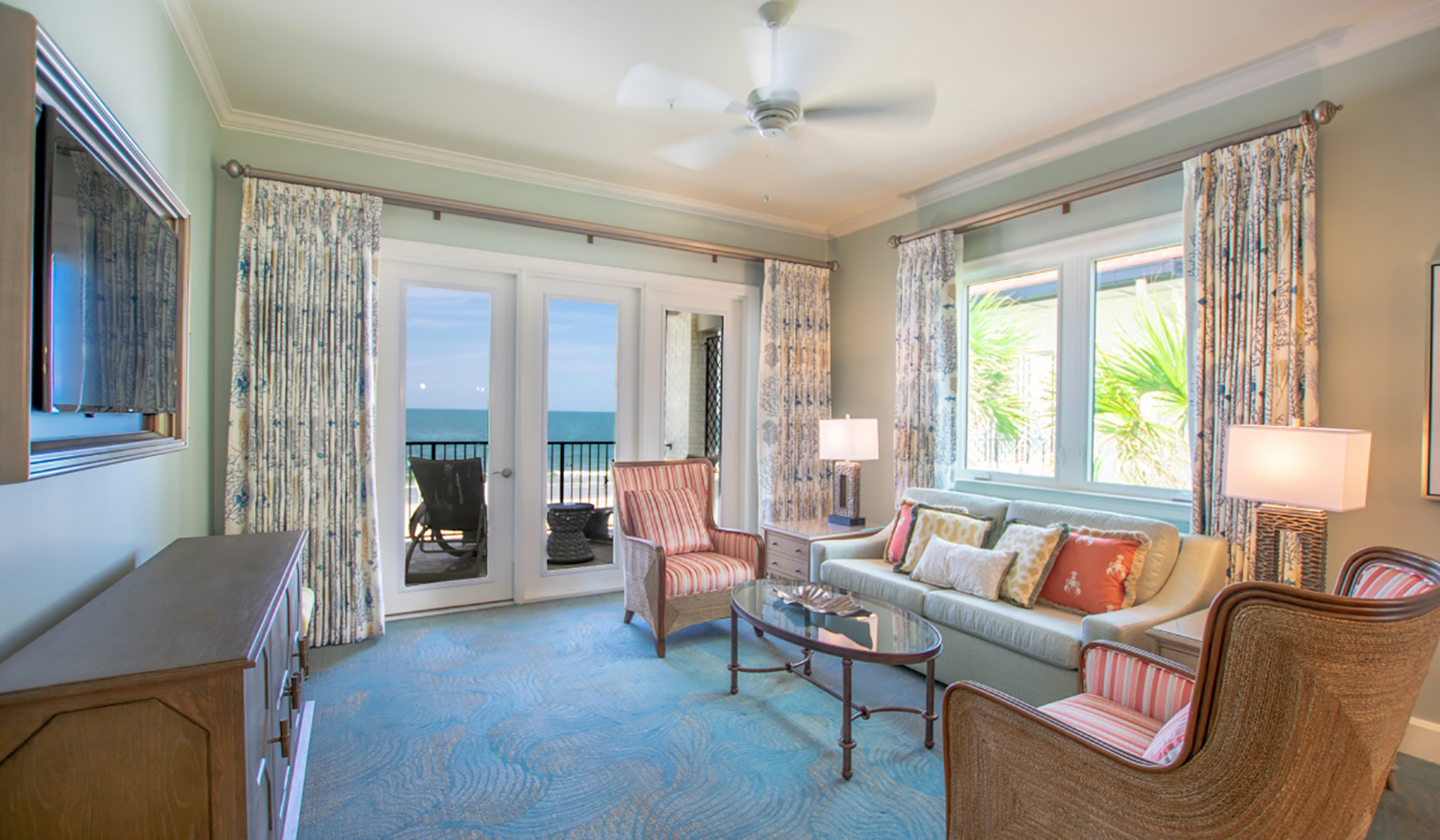 The parlor of a one-bedroom superior oceanfront suite in Ocean House. The same suite is available in the Peyton House and all suites have an optional second bedroom.