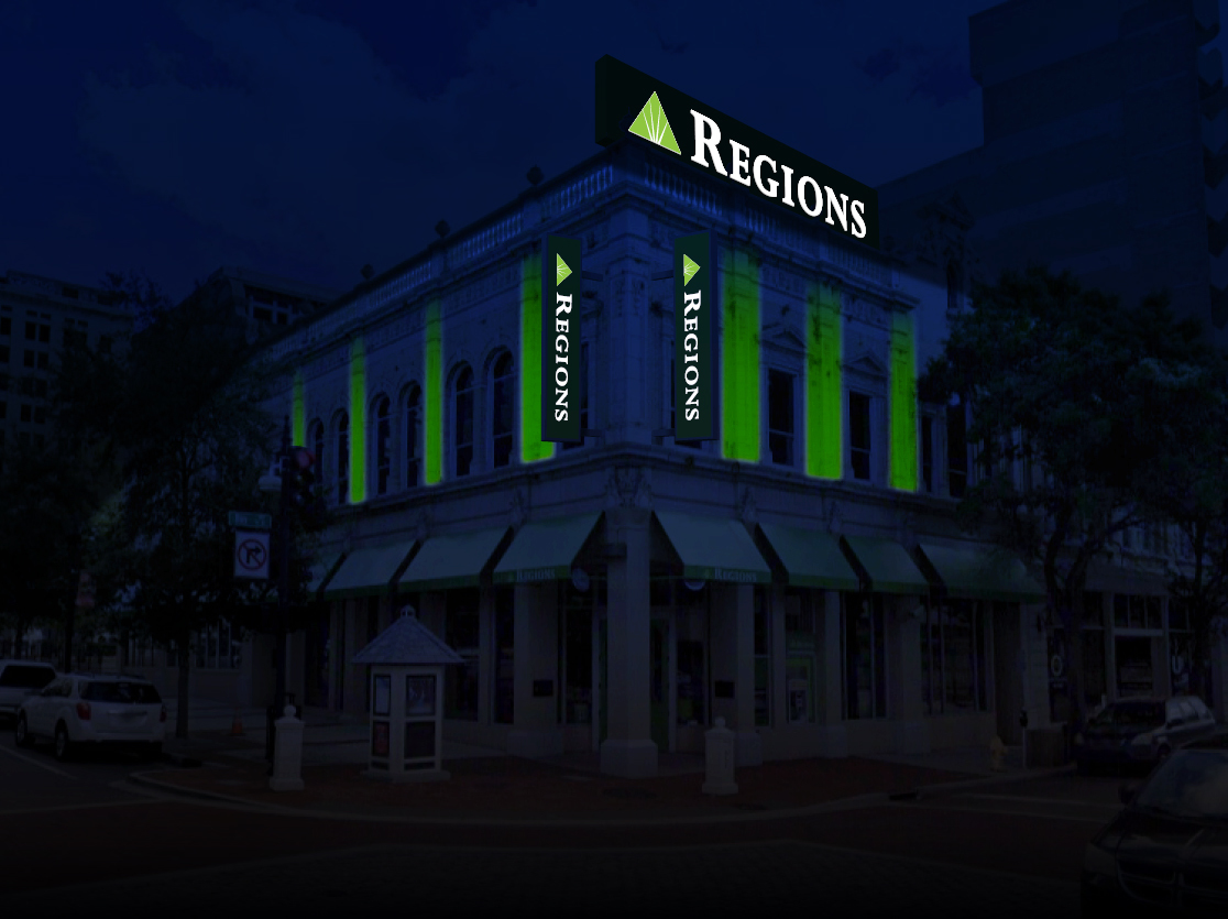 The Regions Bank signage at night.
