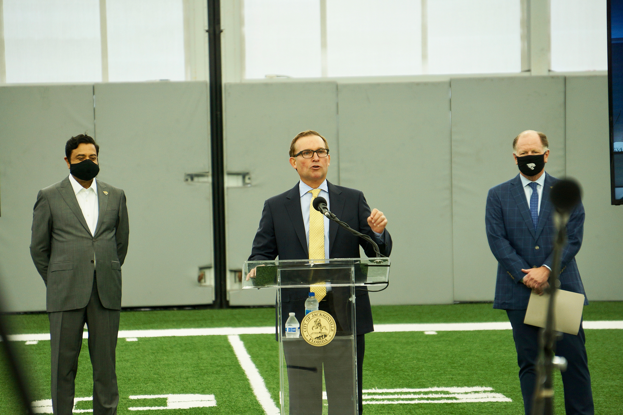 Jacksonville Jaguars owner Shad Khan, Jacksonville Mayor Lenny Curry and Jaguars President Mark Lamping announce the Lot J project. (Photo by Katie Garwood)