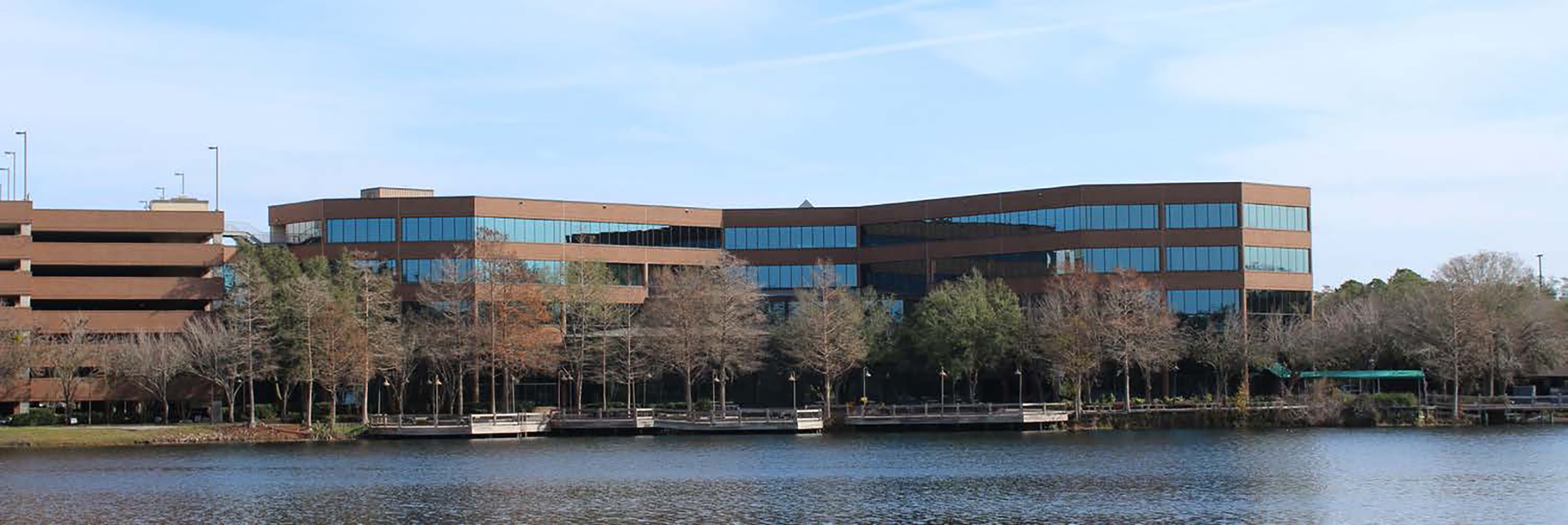 The office building features water views.