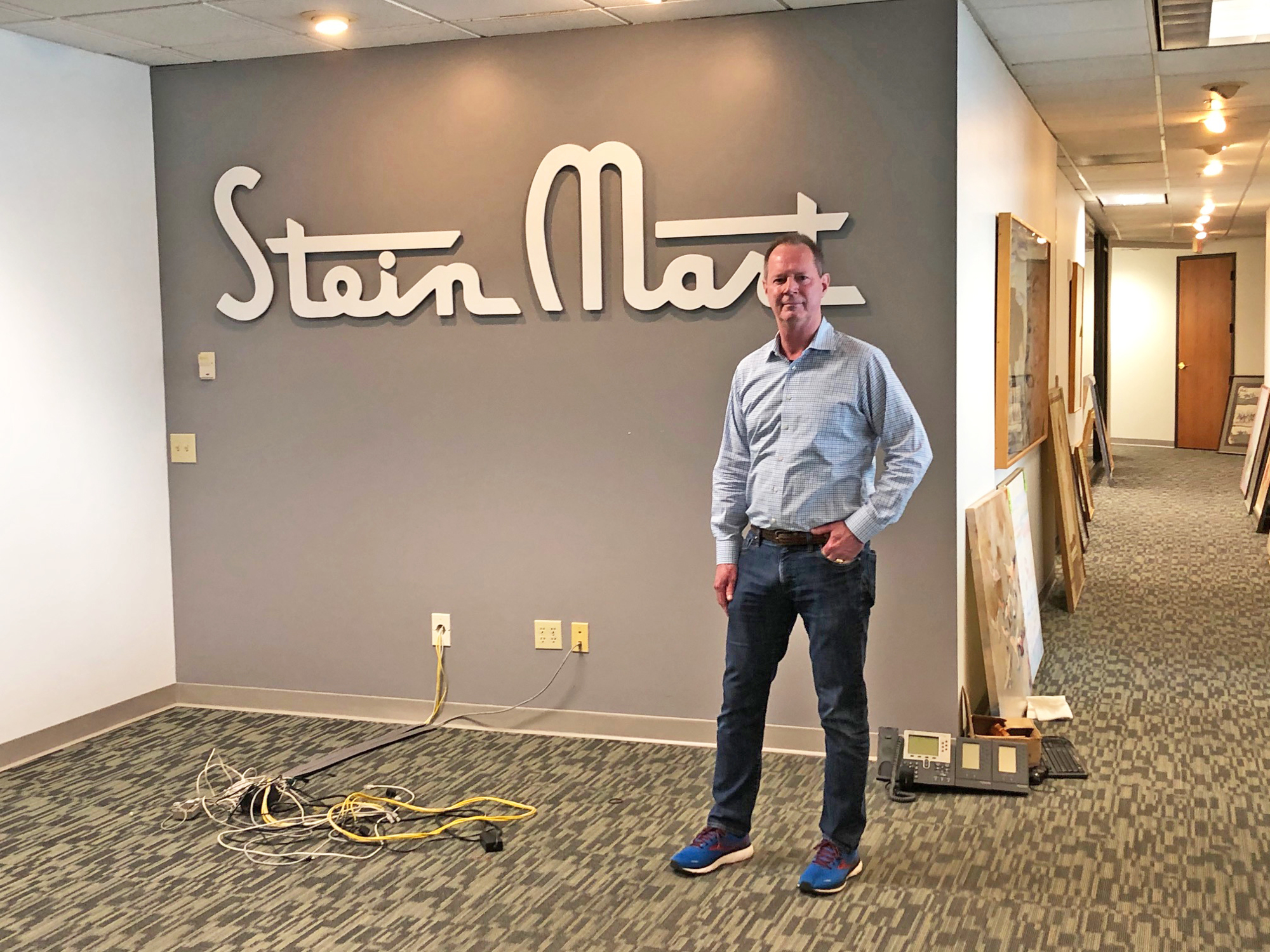 Stein Mart CEO D. Hunt Hawkins shows what’s left in the office lobby at the bankrupt company’s headquarters on the Downtown Southbank at 1200 Riverplace Blvd.