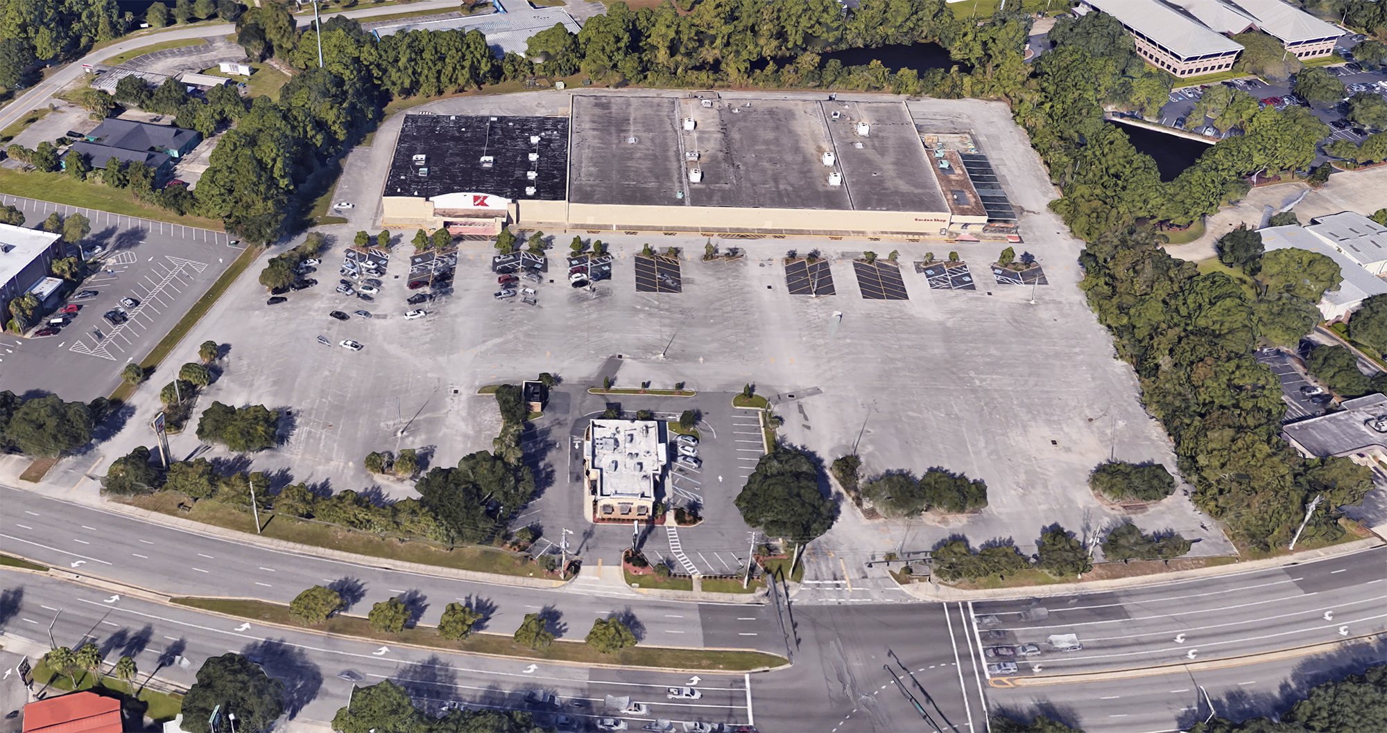 A satellite image of the kmart site. The Zaxby's restaurant in the parking lot is separately owned. (Google)