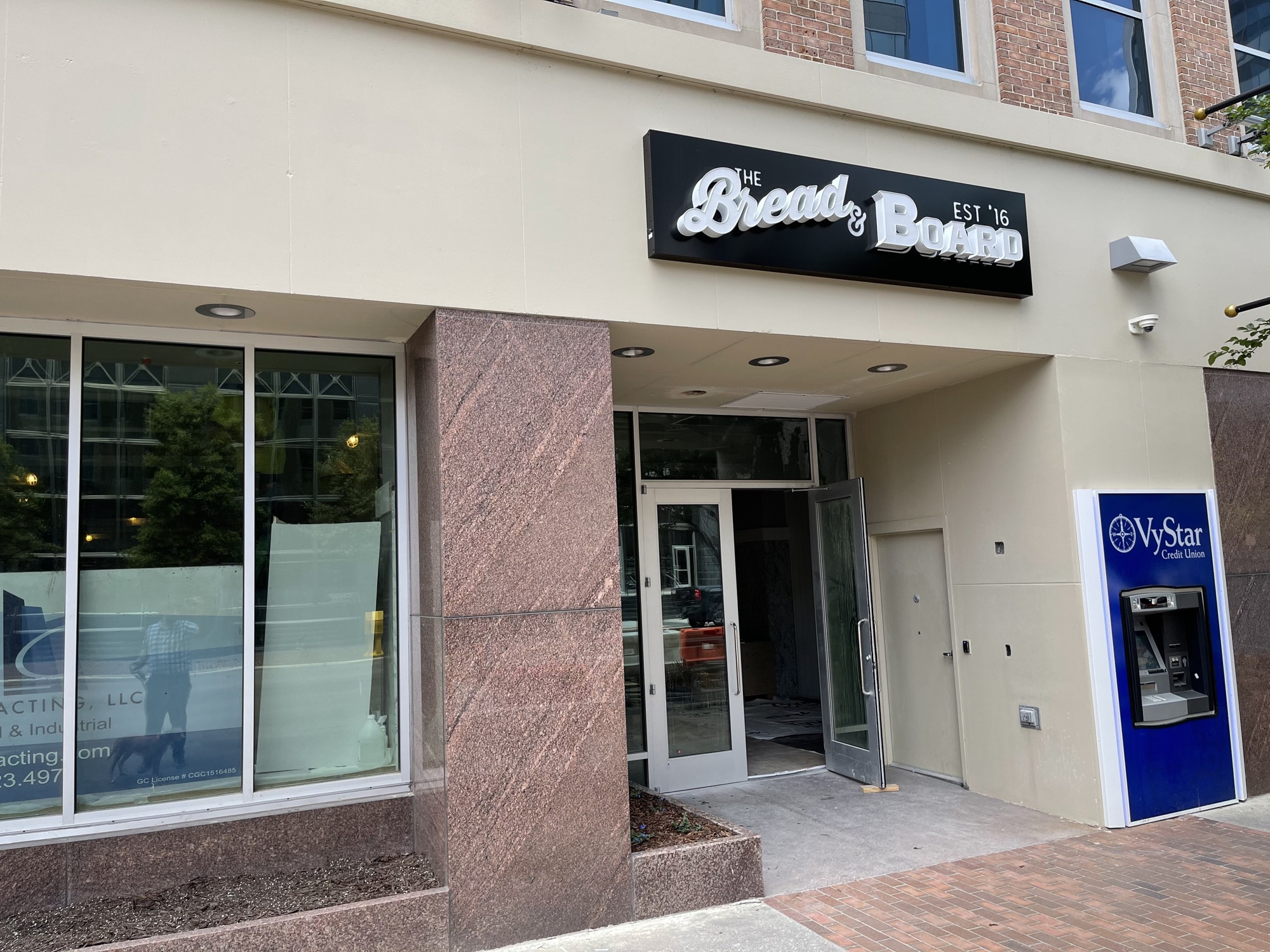 The Bread & Board sign is up at 100 W. Bay St.  It's one of three restaurant concepts planned for the building.