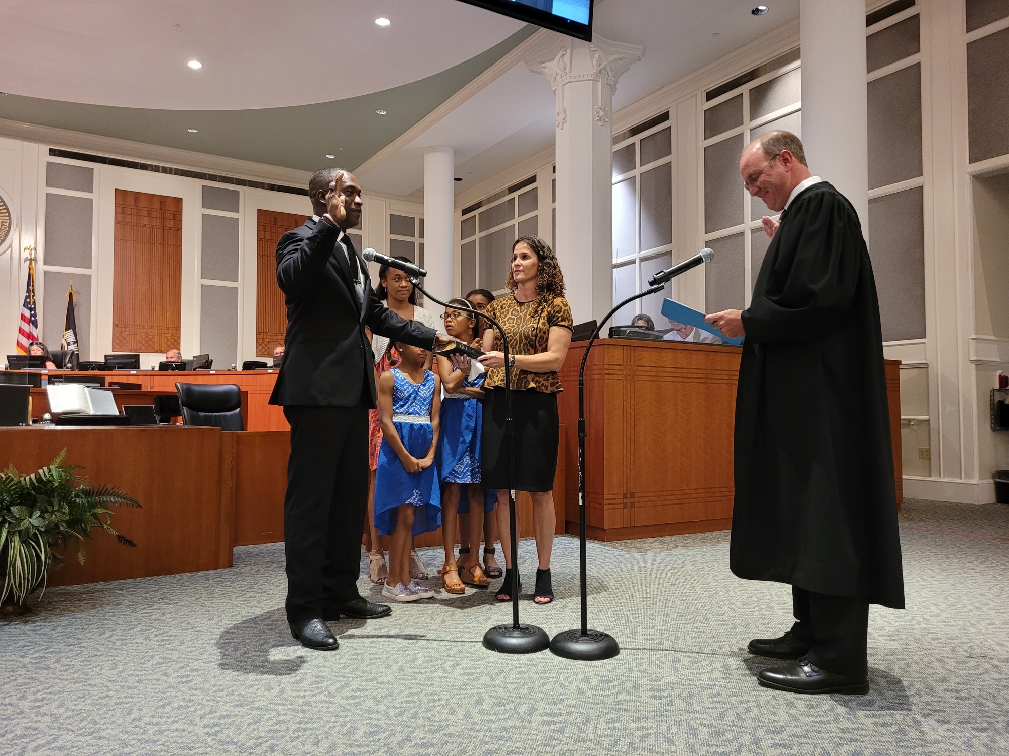 Terrance Freeman is sworn in as Council vice president with his wife, Rachel Freeman, holding the Bible. Witnessing are his daughters Evie, Teryn, Patricia and Lyndee Freeman. Judge R. Lee Smith administered the oath of office.