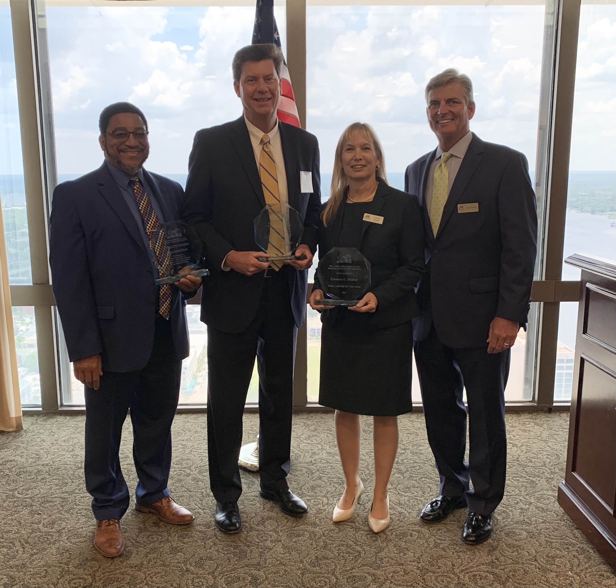 From left, Professionalism Award recipient Raymond Reid; 4th Circuit Judge Bruce Anderson, Jurist of the Year; Trial Lawyer of the Year Corrine Hodak; and chapter President David Dunlap.
