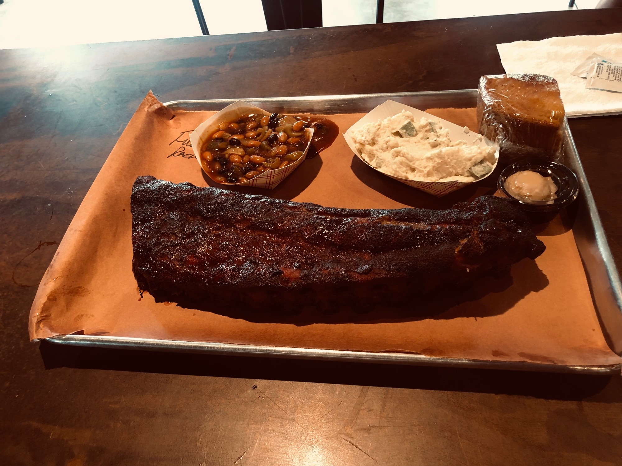 Sugarfire’s menu includes smoked ribs, brisket, pulled pork, turkey and sausage links, salmon, burgers, specialty sandwiches, salads, sides, desserts, shakes and floats, a kid’s meal and more.