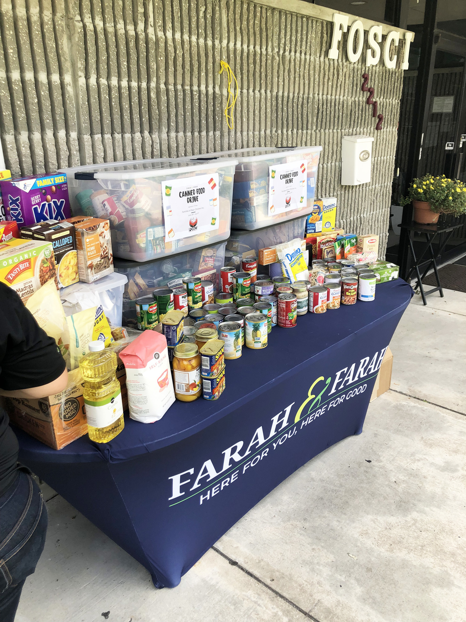 Farah & Farah in Jacksonville, Orange Park and St. Augustine collected and delivered hundreds of canned goods to FOSCI July 23.