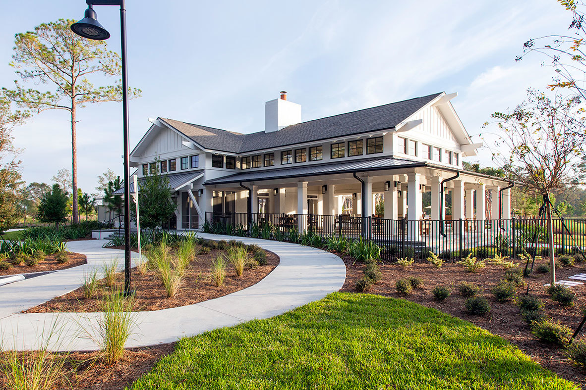 TrailMark The lakeside Camp House is one of the amenities at TrailMark, the GreenPointe master-planned community in St. Johns County.