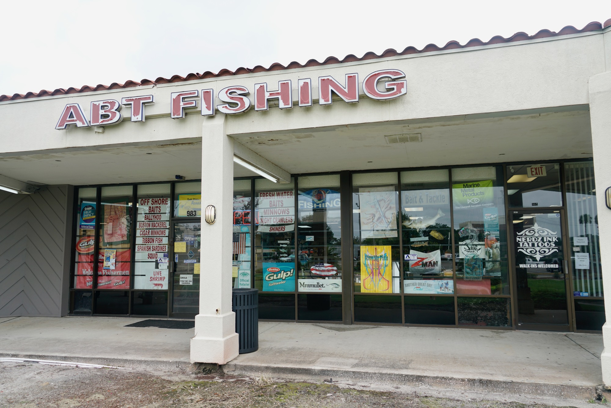 The official name of the shop is Arlington Bait and Tackle Fishing but it became ABT Fishing when the full name was too expensive to put on a sign.