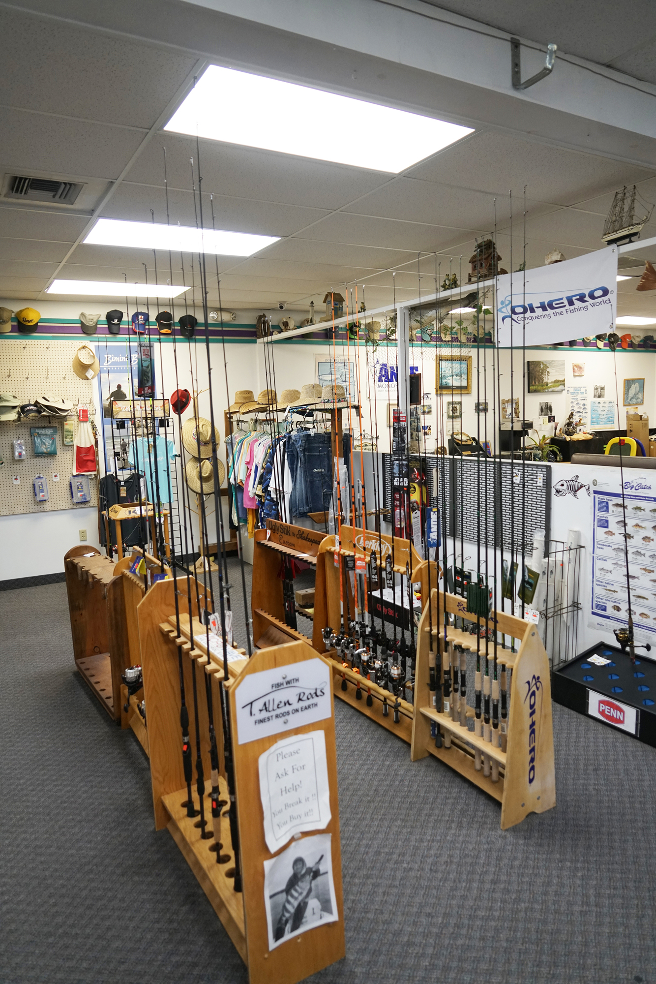 Fishing poles on display inside the shop.