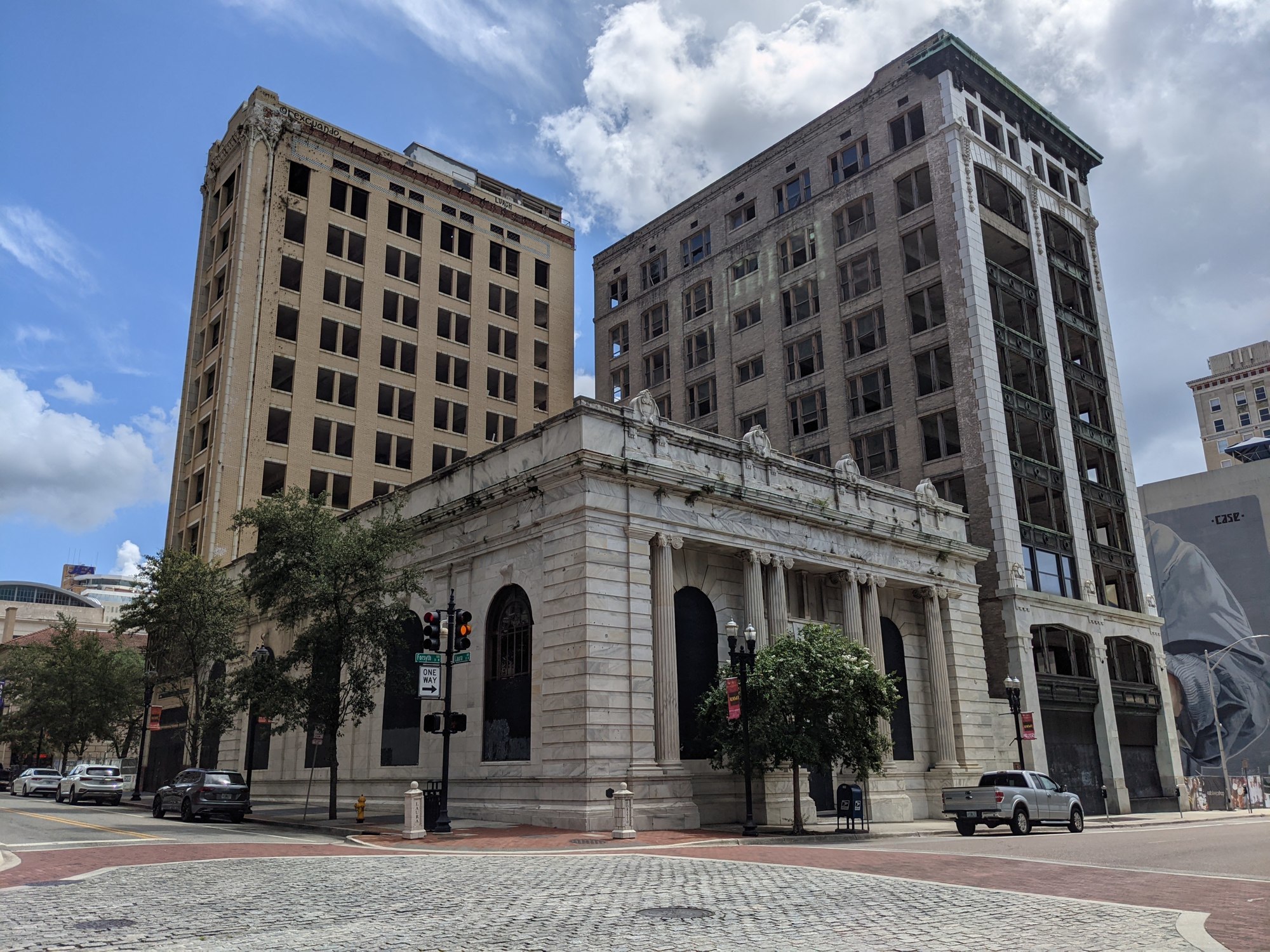 The Trio buildings, built between 1902 and 1912, are historic and contributing structures to the Downtown Jacksonville National Register District.