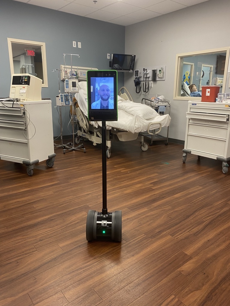 The 4-foot-tall, 16-pound robot features a video screen with a simulated physician for student communication.
