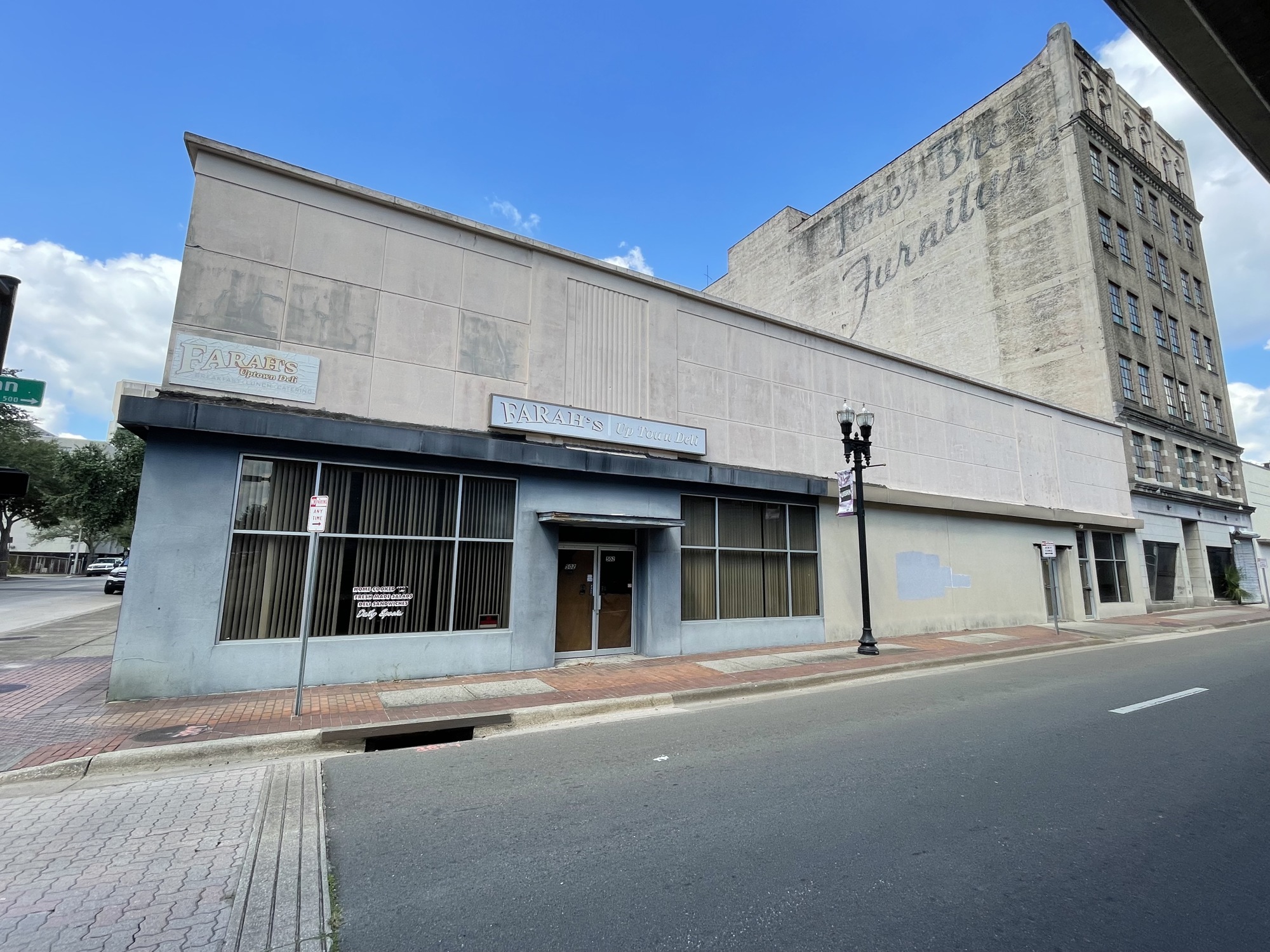 The developers of the Jones Bros. Furniture Co. building want to demolish the former Farah’s Uptown Deli building at Hogan and Church streets and build a six- to seven-story multifamily addition with about 60 apartments.