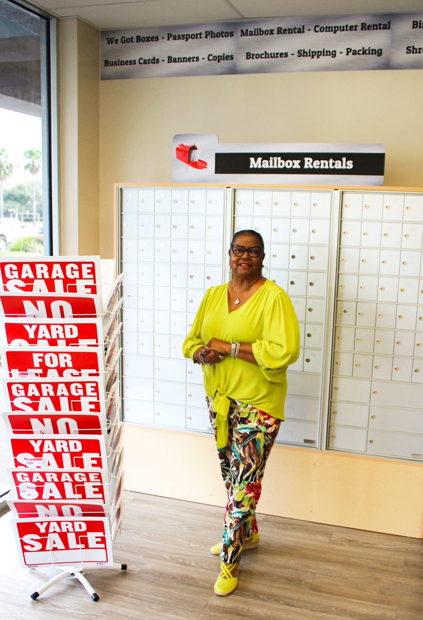 Pamela Payne shows off the store's collection of mailboxes.