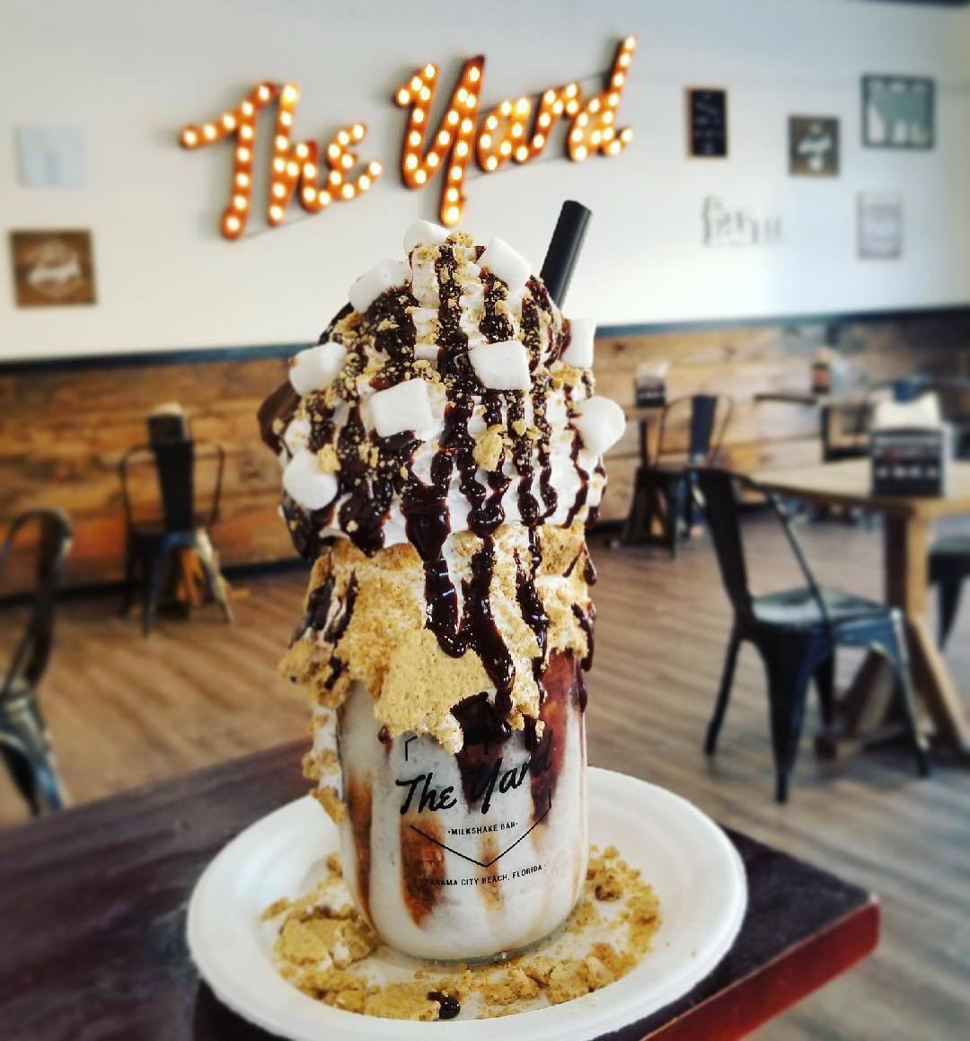 The Yard Milkshake Bar features offers shakes and sundaes like The Cereal Killer, Old School Banana Split, Doughnut Touch my Coffees and Cream, and Salted Caramel Cheesecake.