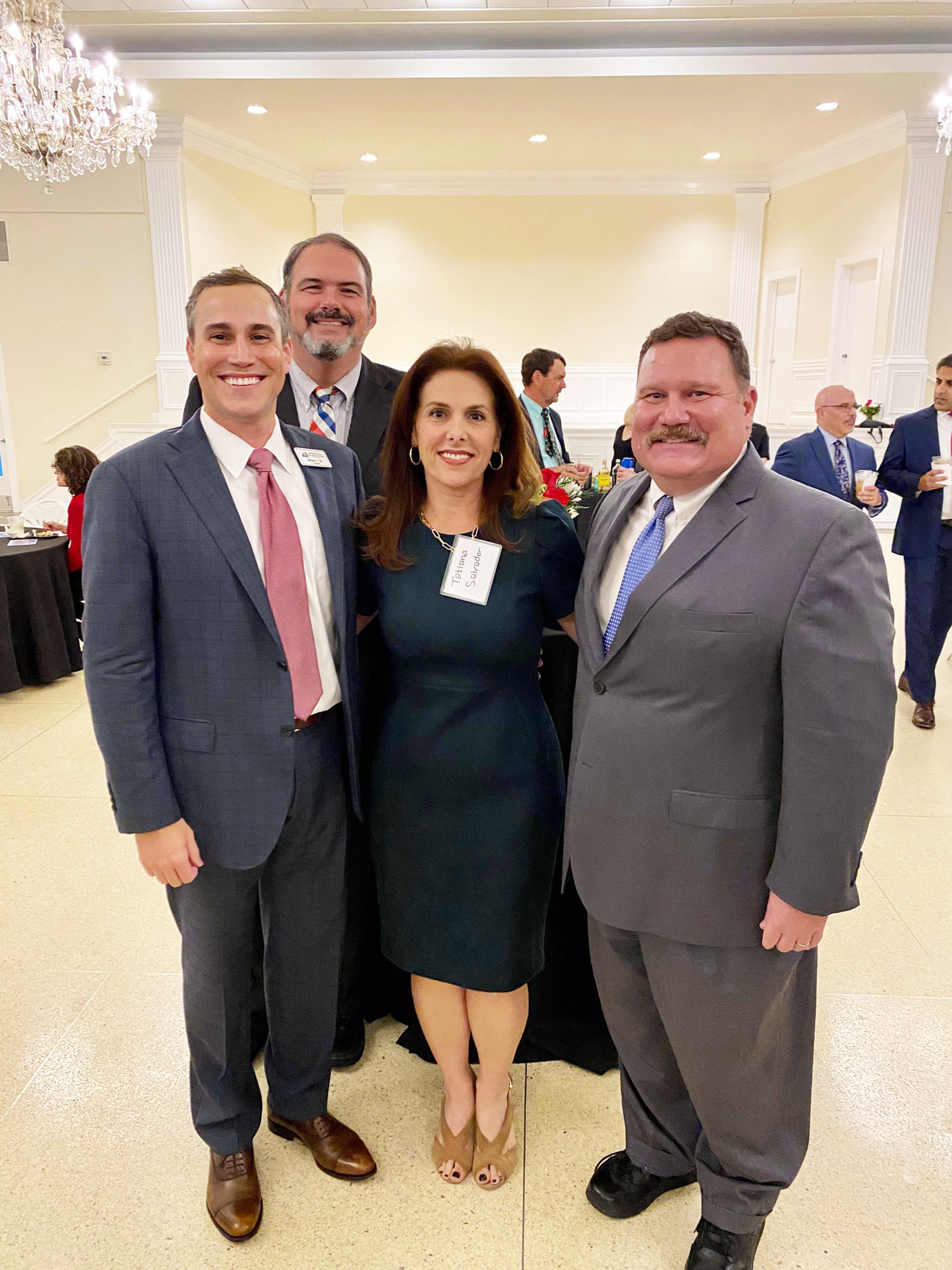 From left, Jacksonville Bar Association President Michael Fox Orr, 4th Circuit Judge Eric Roberson, 4th Circuit Judge Tatiana Salvador and First District Court of Appeal Judge L. Clayton Roberts at the Bench & Bar Holiday Party.