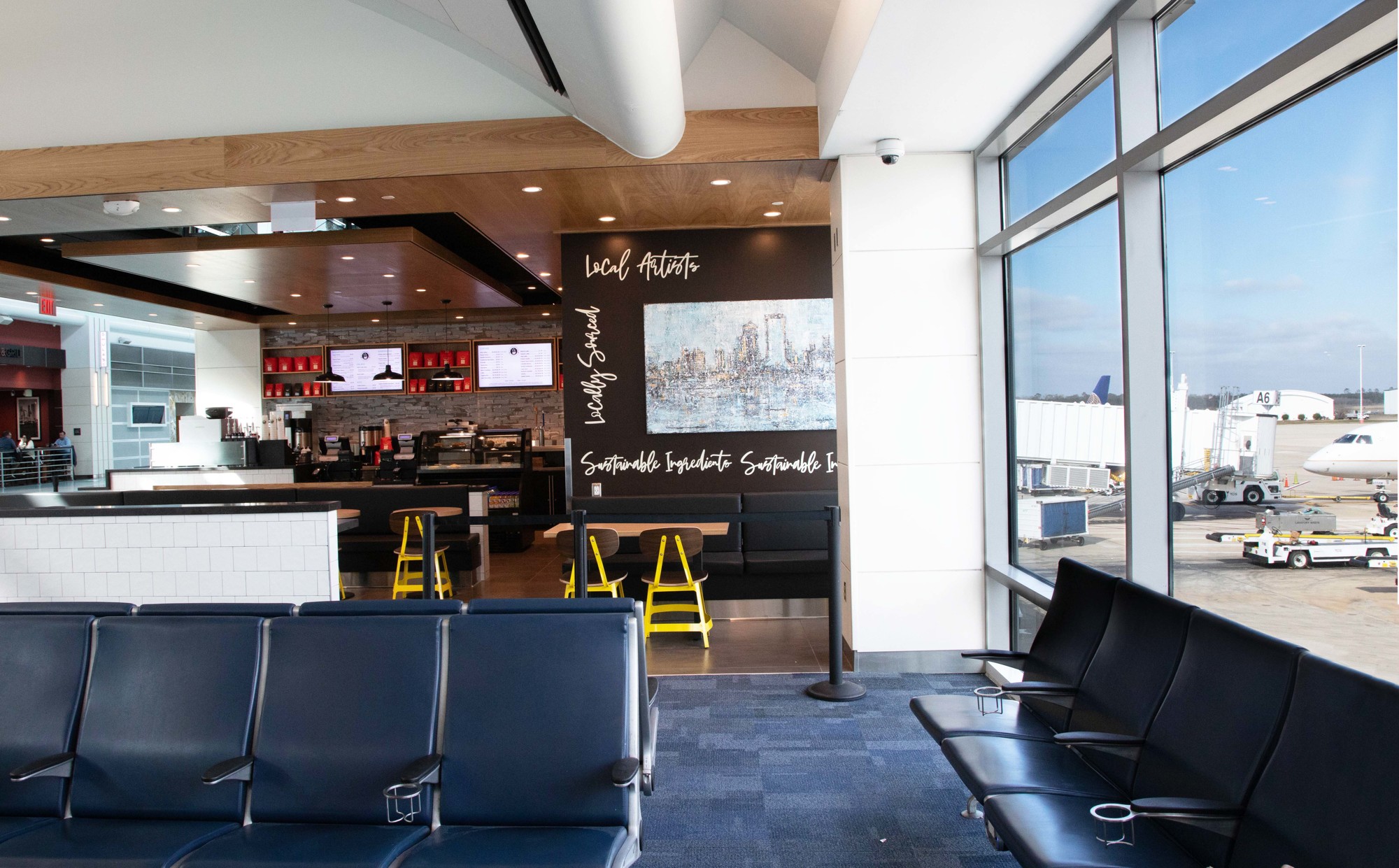 The post-security Concourse A location offers seating by the concourse or near windows.