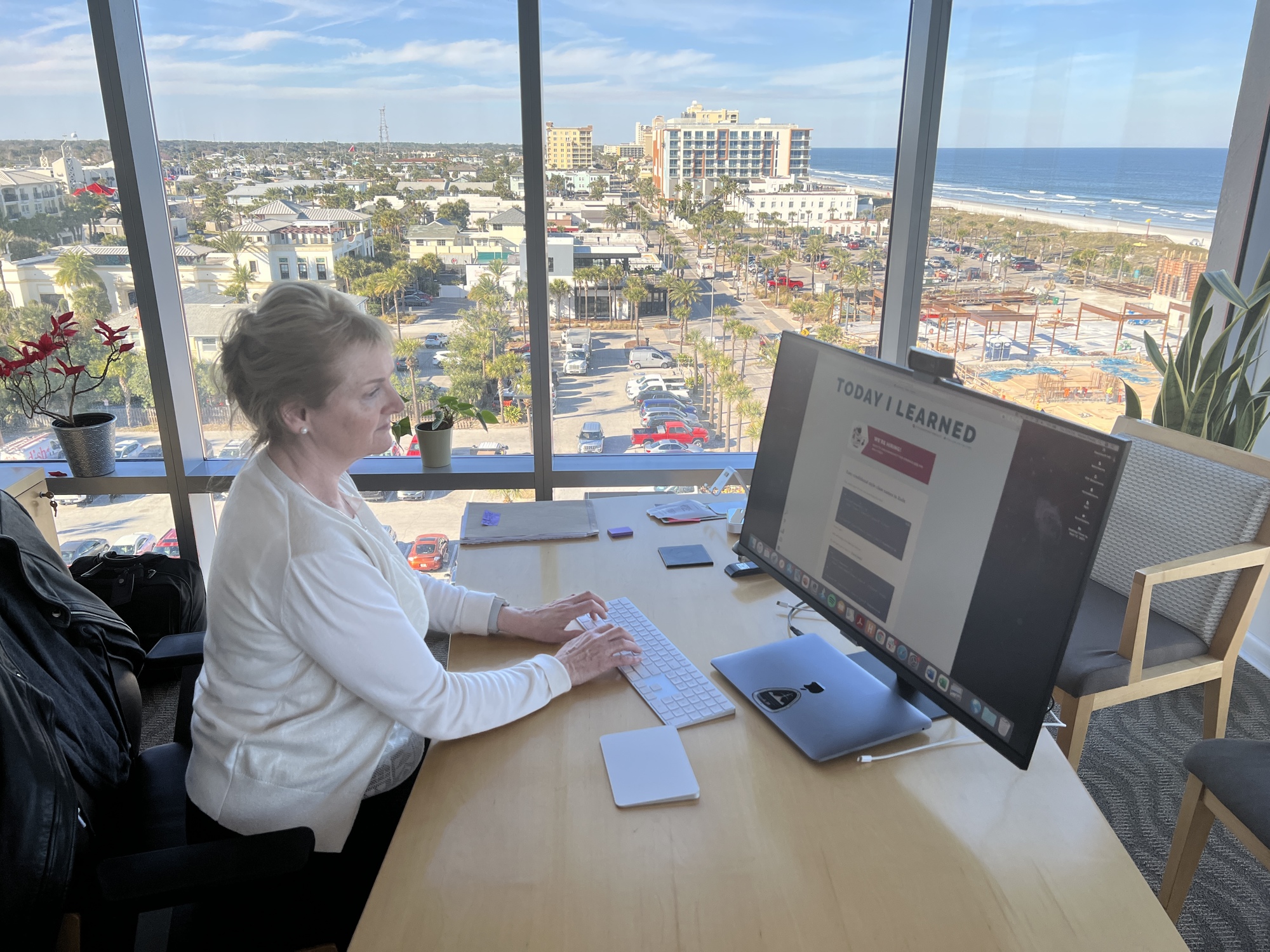 From the company’s offices on the seventh floor at 320 N. First St. in Jacksonville Beach, Hashrocket CEO Marian Phelan shows the company’s “Today I Learned” website that helps computer programmers find solutions and fixes and share ideas.