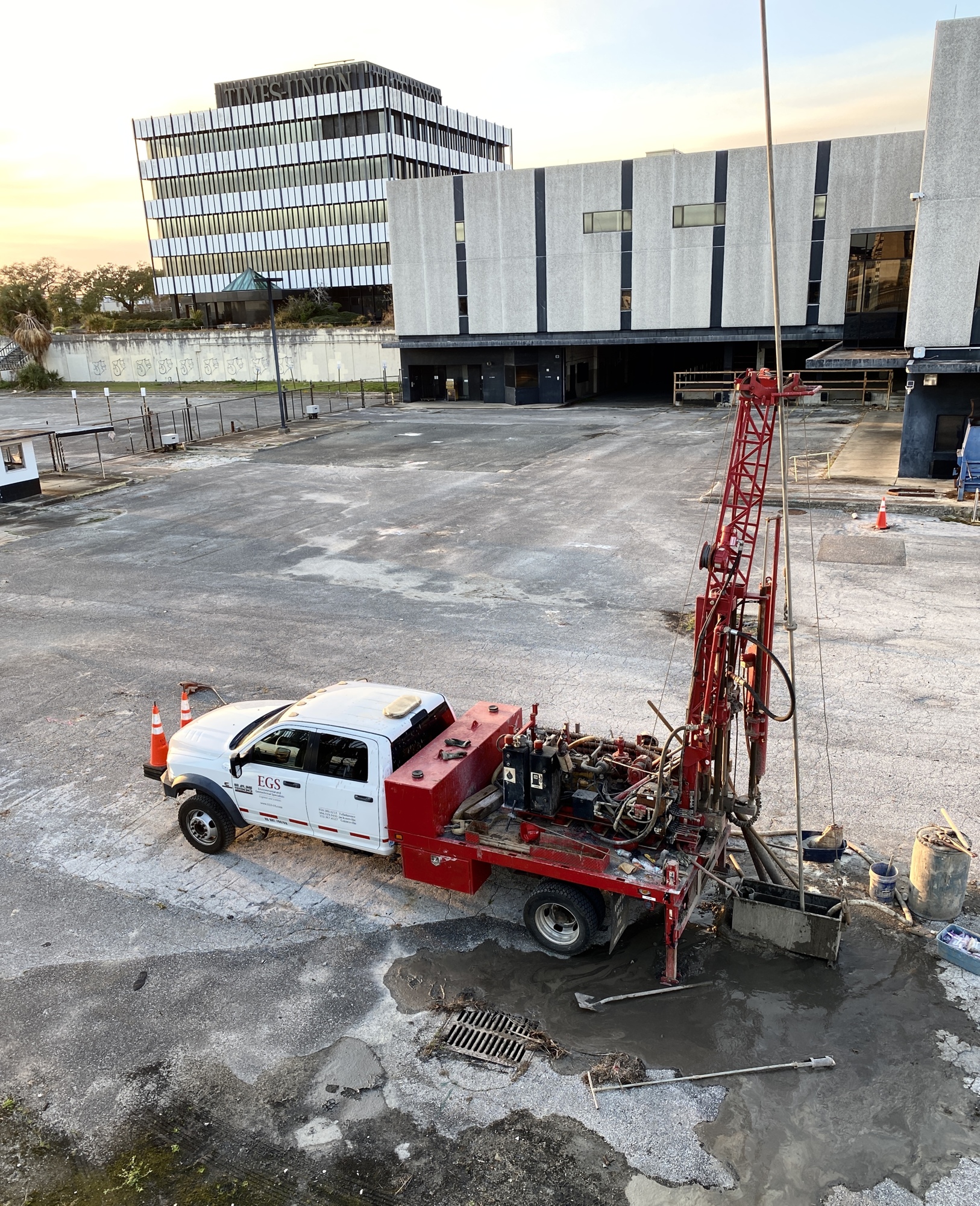 A truck from  EGS Environmental and Geotechnical Services probes the parking lot outside of the former  Times-Union production building where the newsroom and pressroom was located. (Photo by Scott Simpson)