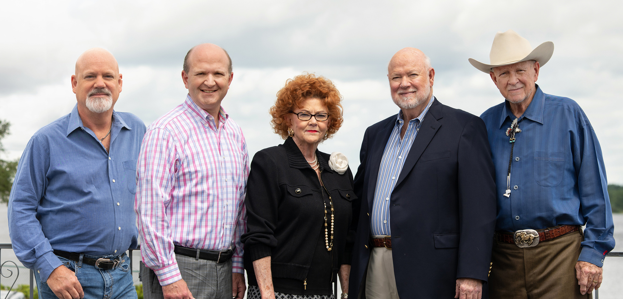 The Shaw family: From left, Howard “Bubba” Shaw Jr., John Shaw III, Sylvia Shaw Pitman, Howard Shaw and John Shaw. All are involved in running Shaw Family Seafood Co., now in its fourth generation of family leadership.