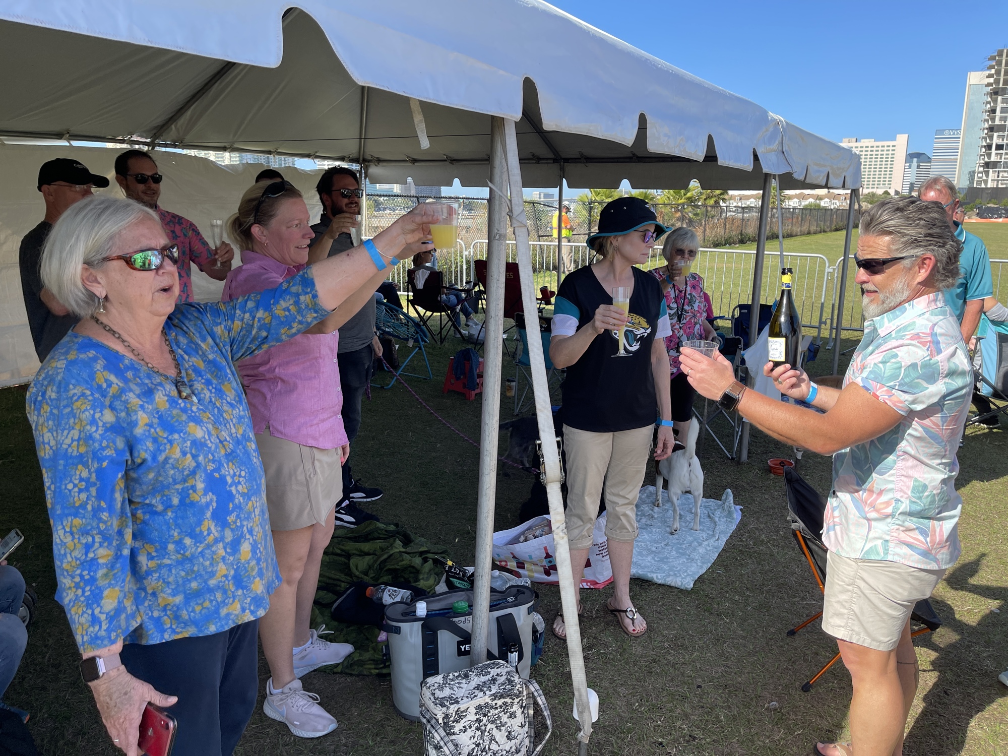 Residents of the nearby The Plaza Condominium toast the implosion of the Berkman II.