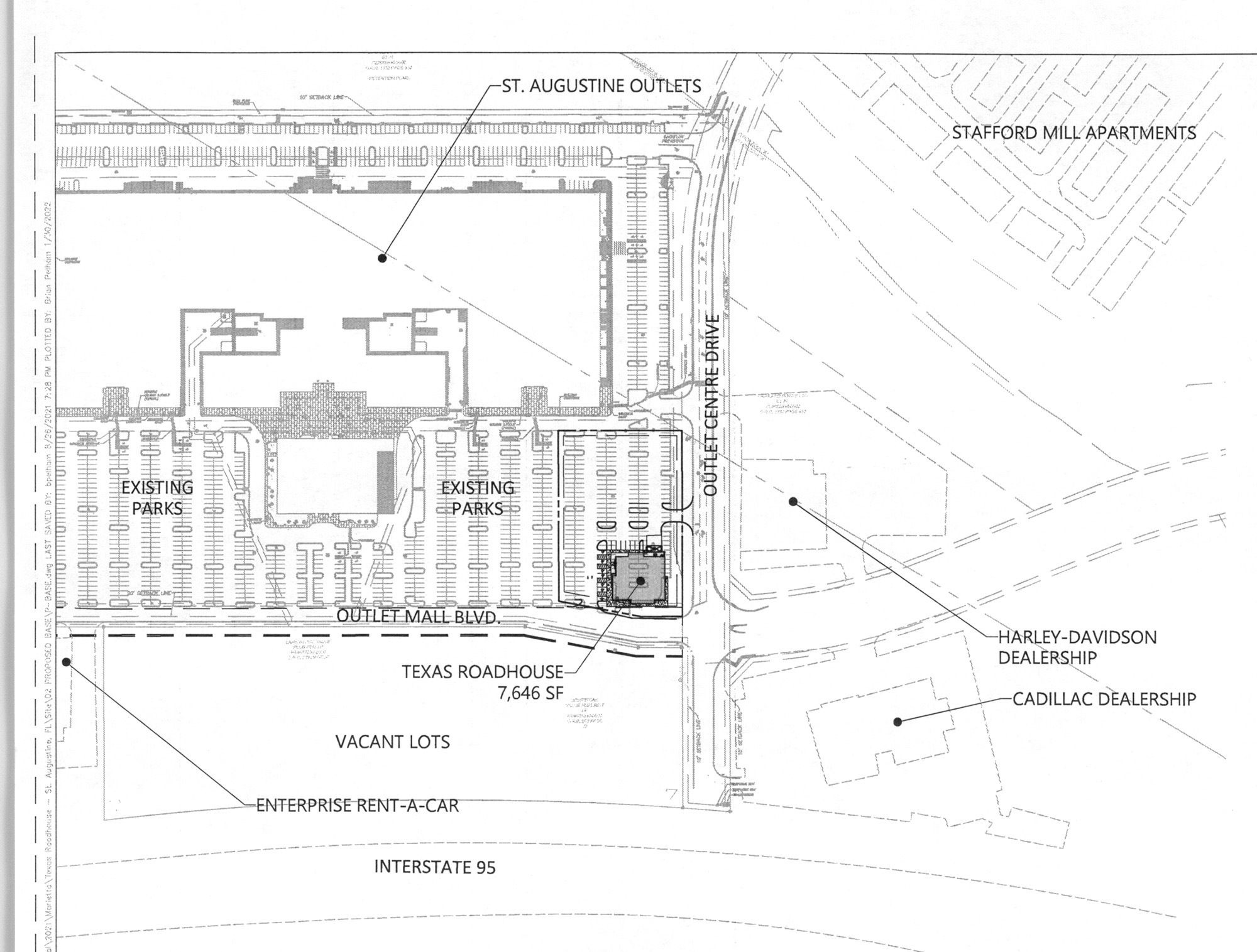 Texas Roadhouse is planned near the Cadillac and Harley-Davidson dealerships in front of the outlet mall.