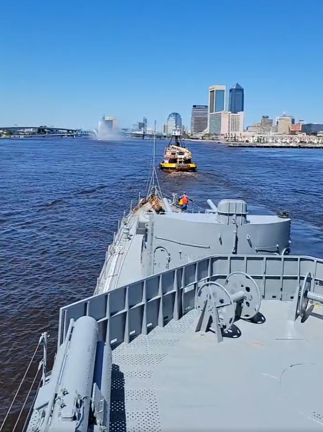 A Jacksonville Historic Naval Ship Association image of the USS Orleck arriving near Downtown.