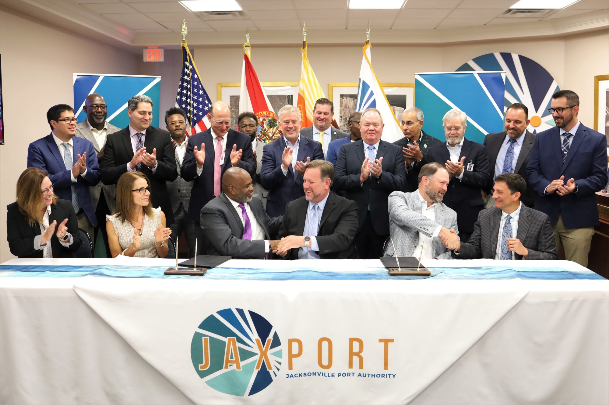 JaxPort and and Southeast Toyota Distributors LLC executives sign the deal for the new 25-year lease that includes a new facility.