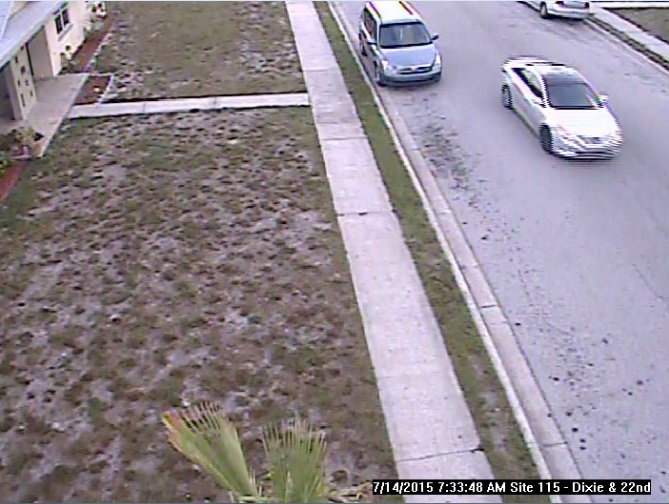 The Sarasota Police Department says the man who spoke to children at a bus stop this morning was in the passenger seat of this silver car.