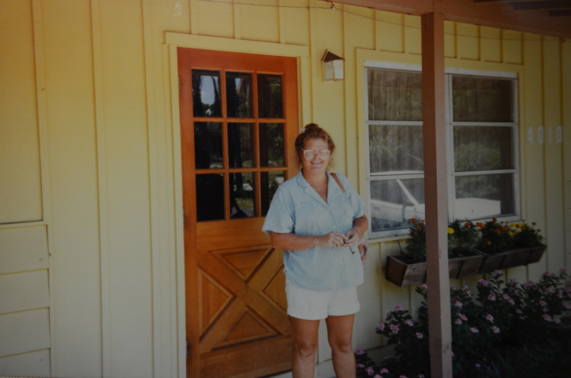 Courtesy photo. Janet Hember at the front door to Swiss Day Preschool a couple of years after she purchased the school.