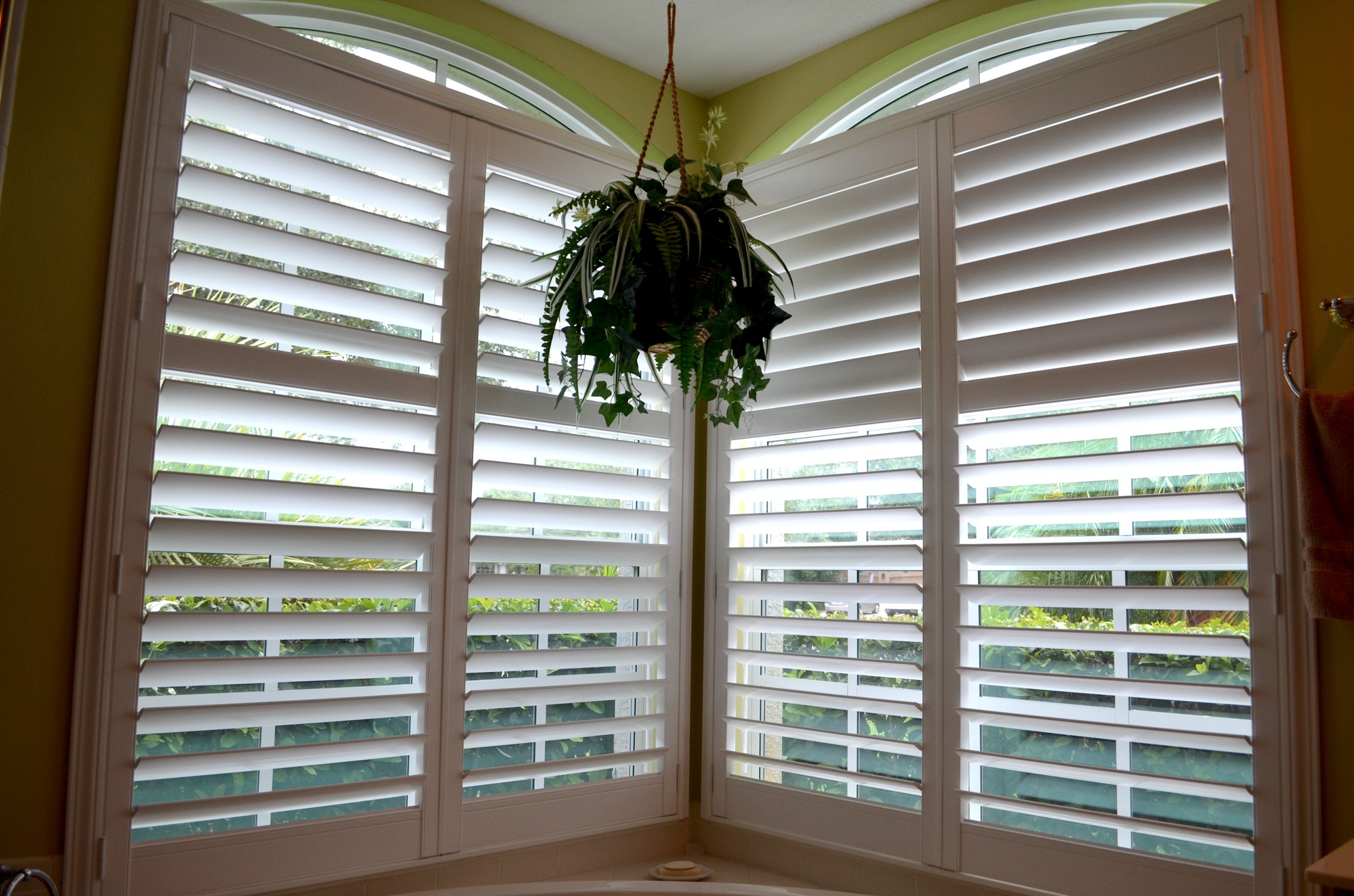 Hurricane proof glass alleviates the need for shutters, but can be a costly option. The O'Briens spent more than $4,000 on two hurricane glass windows in their bathroom.