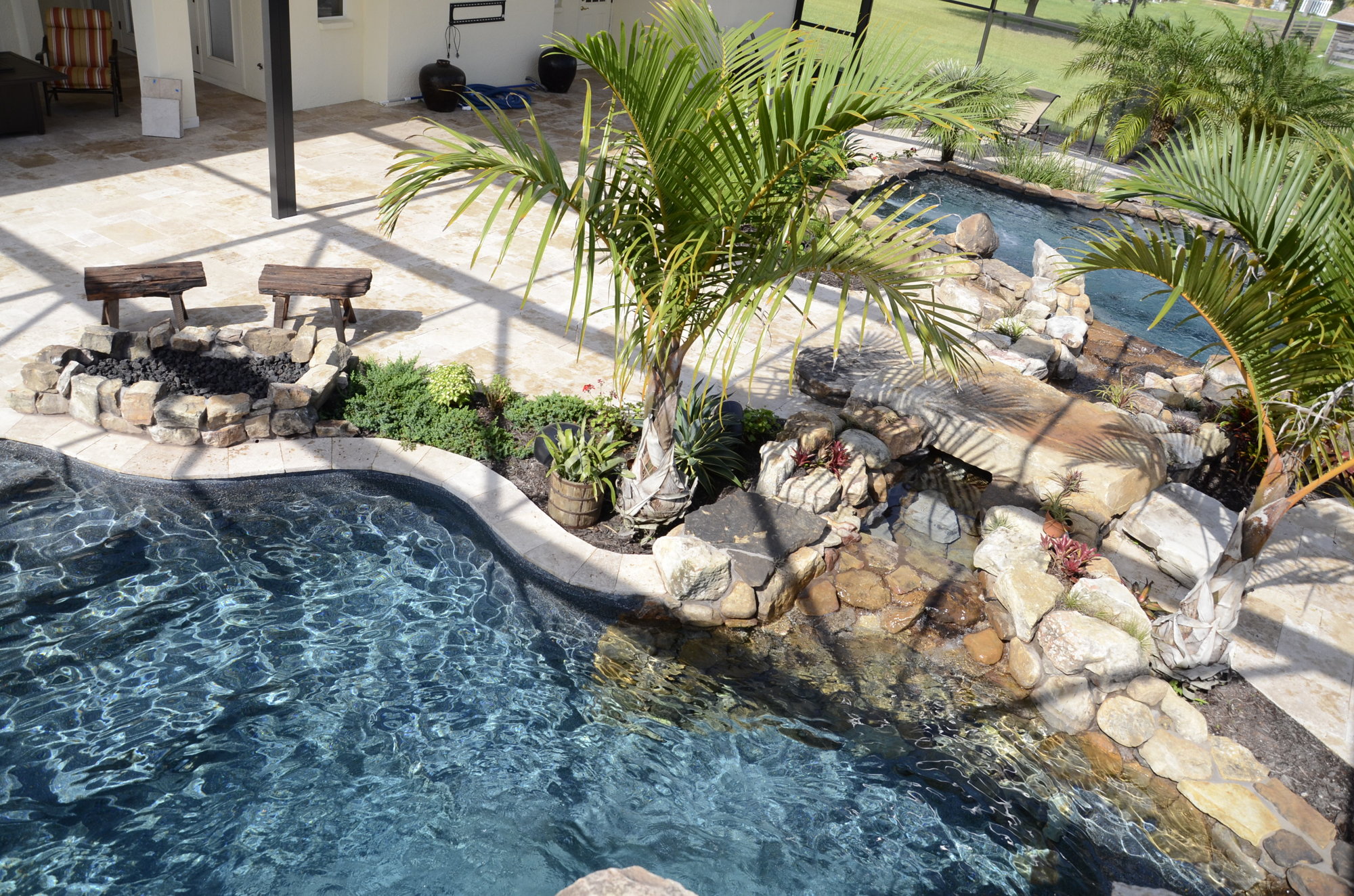 The Taylor's personal oasis is a natural double-pool set up with a 