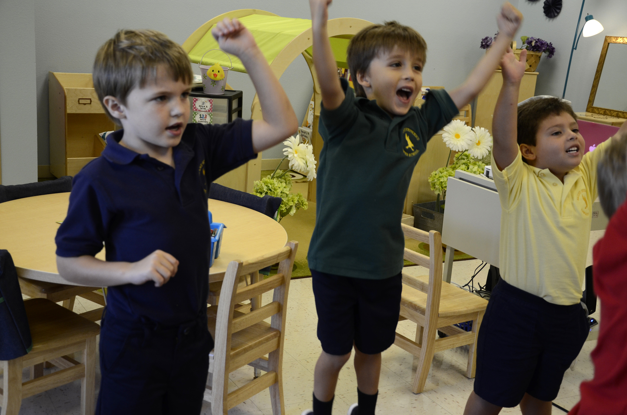 Collin  Freeman, Brennon Bonnett and Paul Cronen got excited during singing in class.