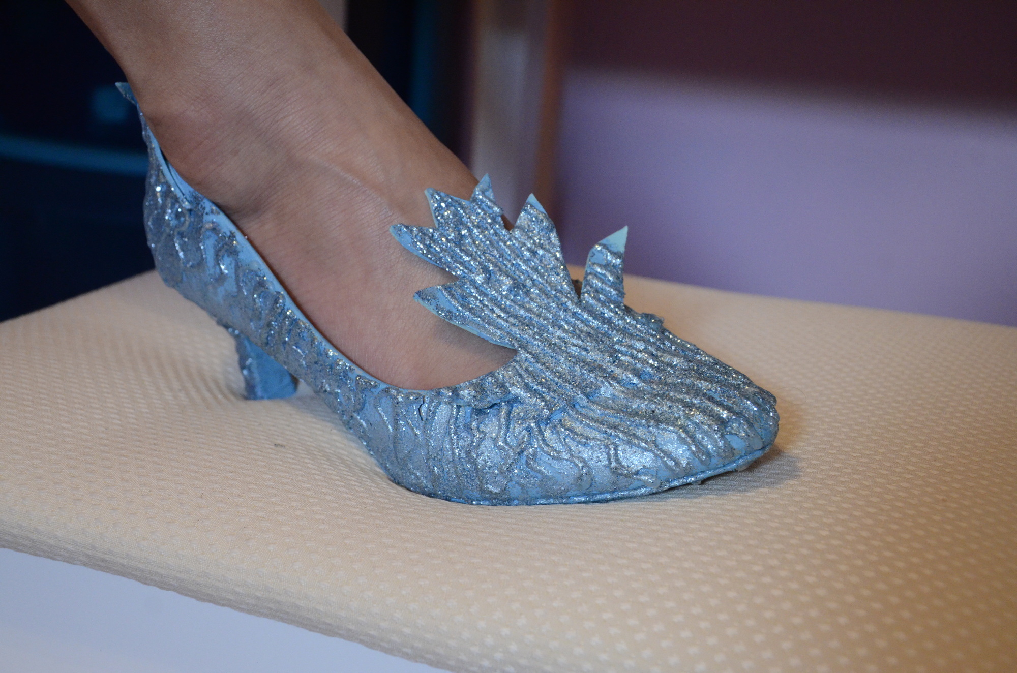 Although Belle purchases the bulk of her costumes, she still designs some pieces herself, including these shoes for her Elsa costume.