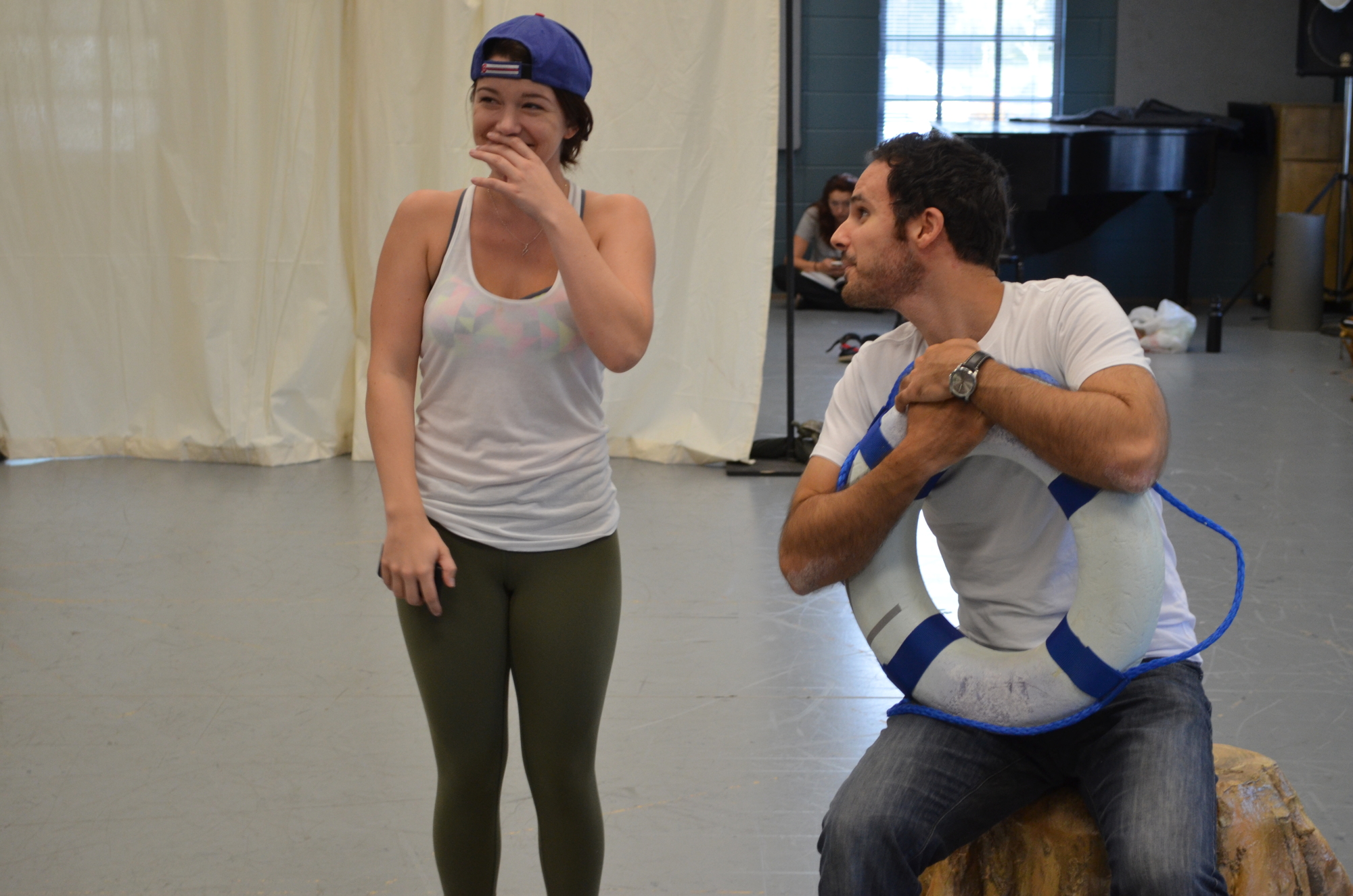 A playful moment between Kelsey Petersen (Viola/Cesario) and Kevin Barber (Orsino).