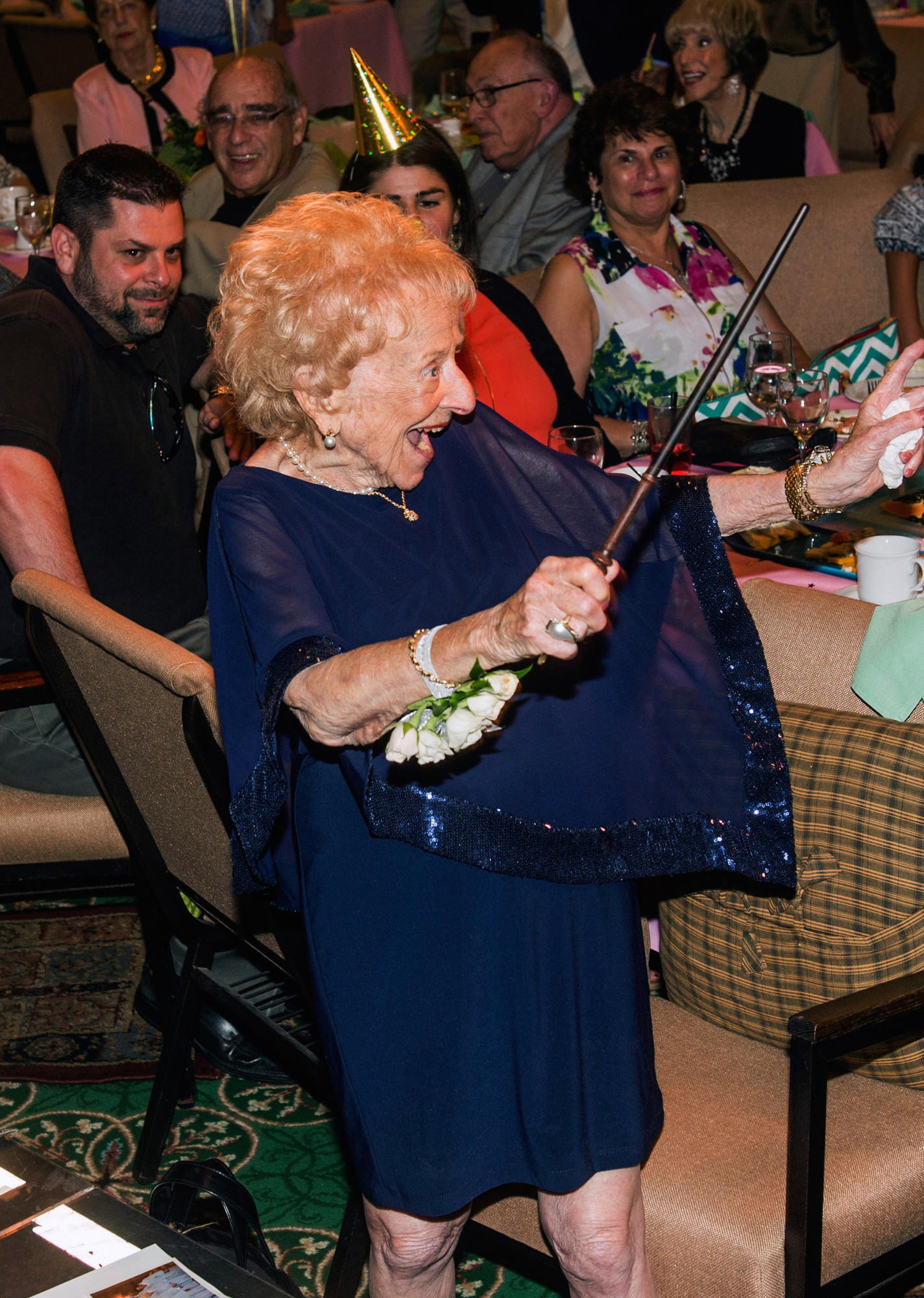 Florence Katz with baton at 100 years old! Photo by Cliff Roles