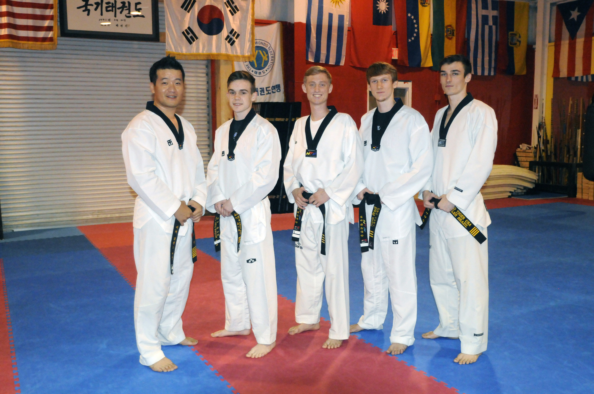 Deven Rutland, Isaac Weintraub, Travis Brazil and Tyler Brazil, pictured with Master Jin Hwang, far left, represented Red Tiger Martial Arts at the 2015 USAT National Championships this past July.