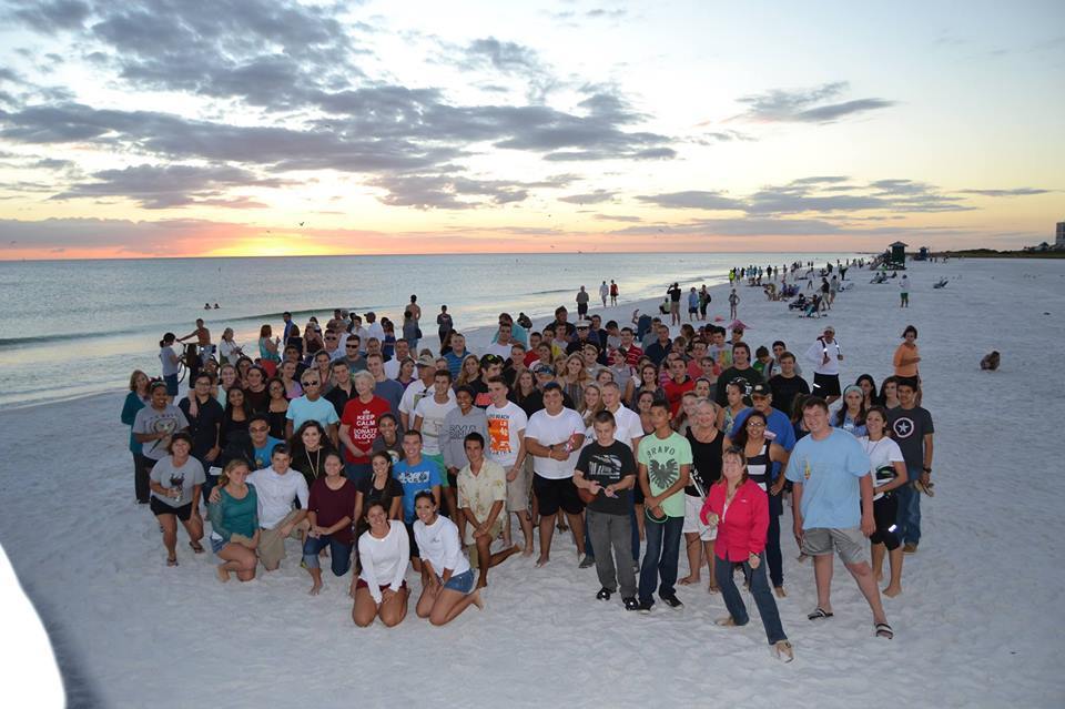 Courtesy photo. Sarasota Military Academy cadets and alumni gathered on Siesta Key Beach for a memorial for Dennis Richardson Wednesday evening.
