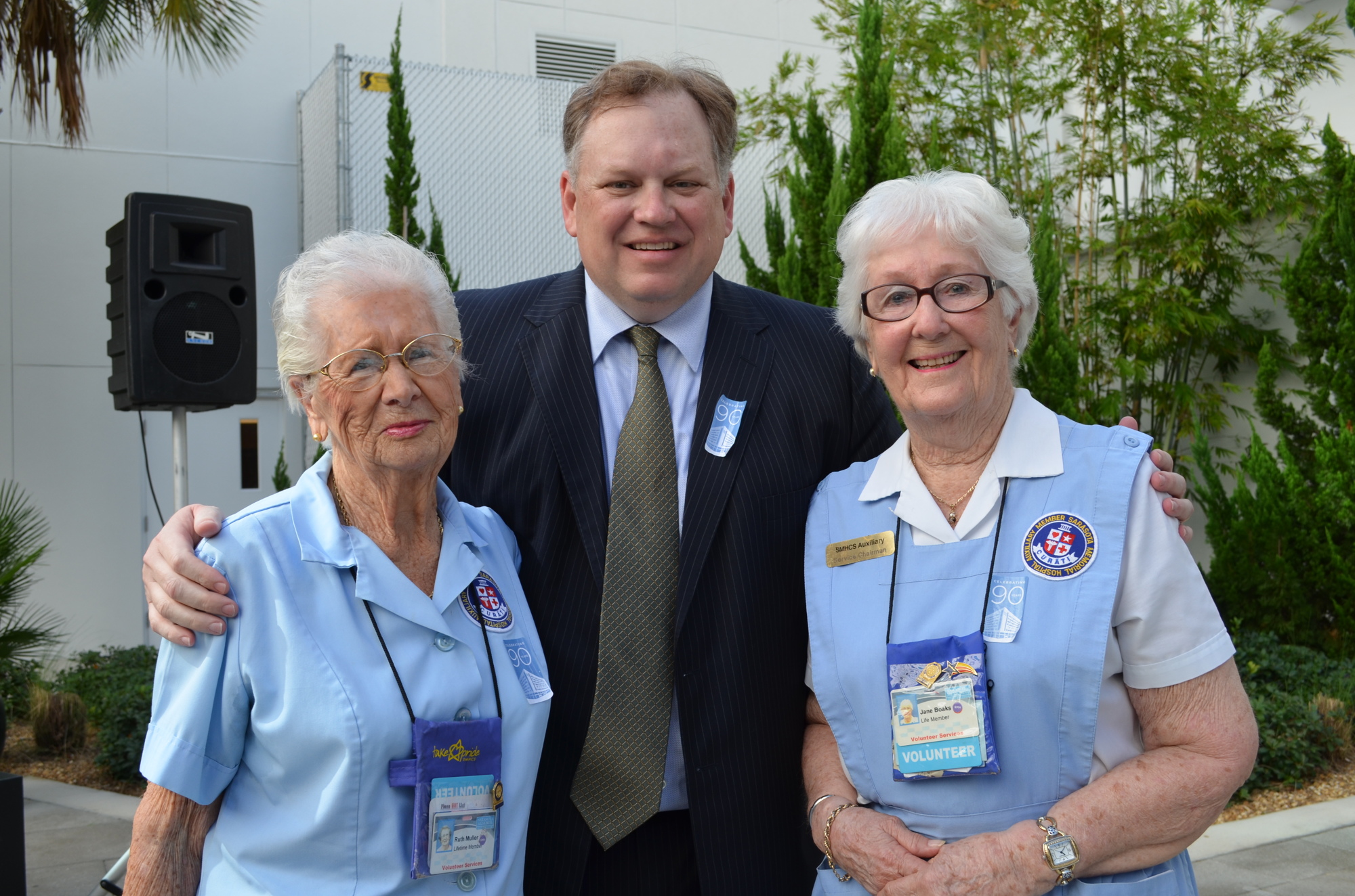 Long-time volunteers Ruth Muller and Jane Boaks with Sarasota Memorial Health Care System President and CEO David Verinder.