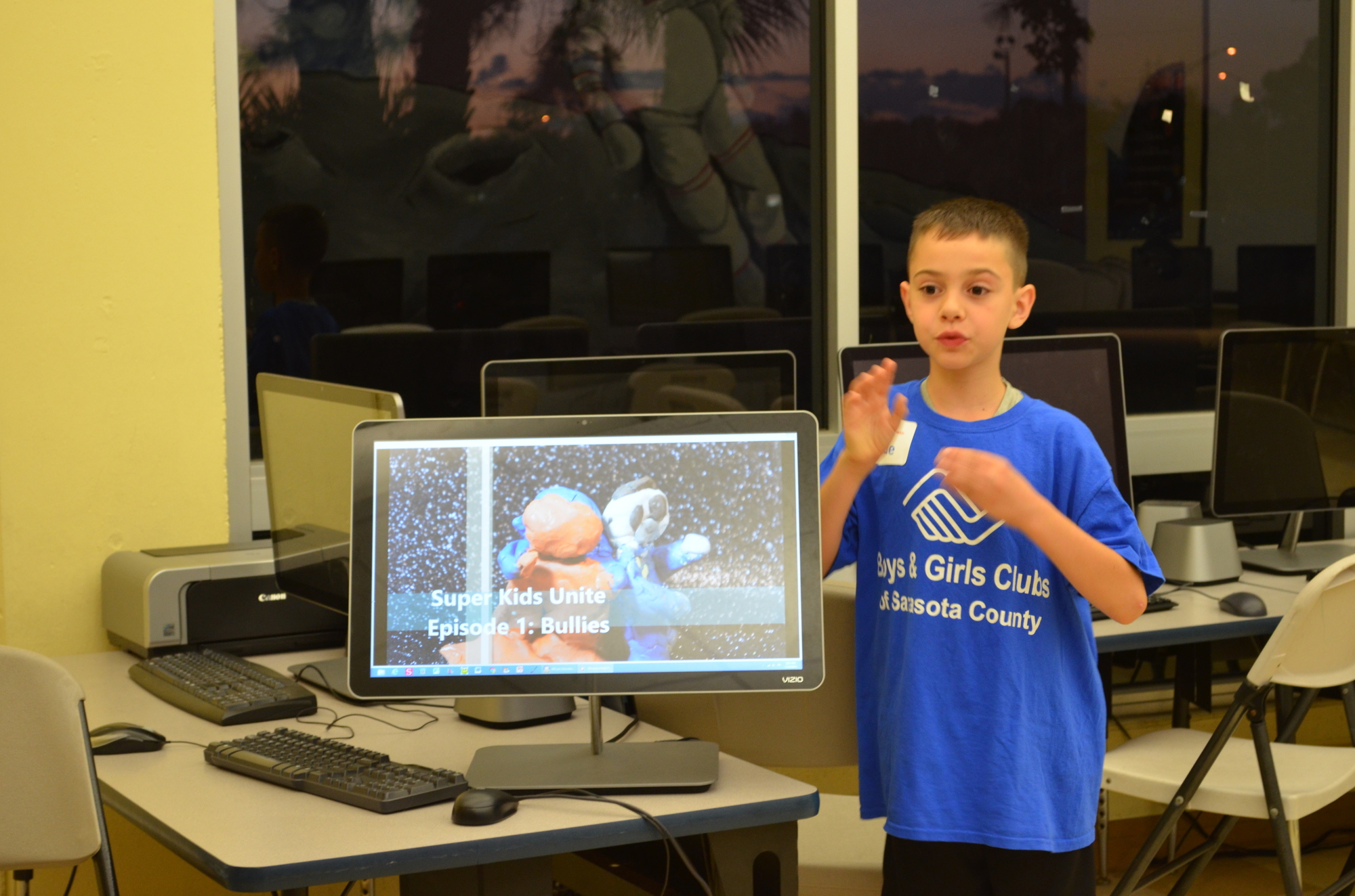 Shade Halscheid shares a claymation video he learned to make during the after-school program at the Boys & Girls Club Lee Wetherington Branch.