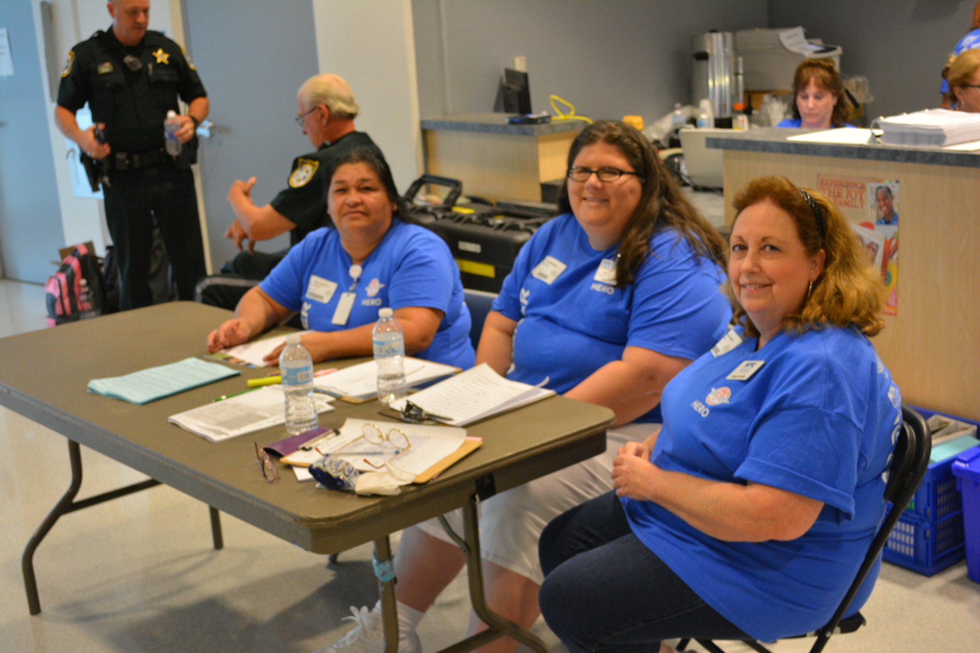 Bradenton's Mary Guerrero, Emma Markum and Mandy Steffen, all employees at Manatee Technical College, donated their time to check in patients at the Remote Area Medical clinic.