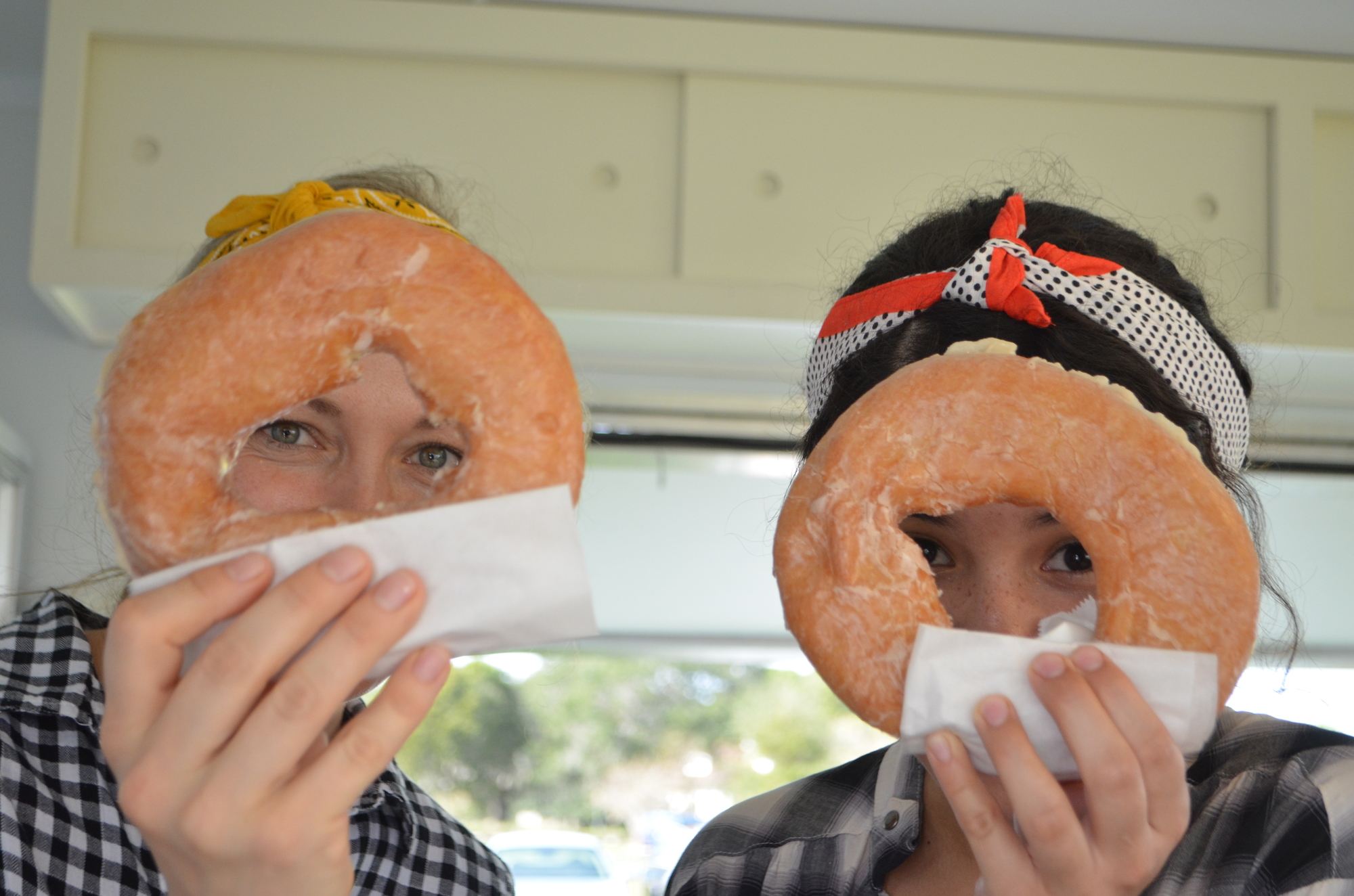 Sadie and Roselyn Peachey delight in delivering their donuts to the foodies of Sarasota.