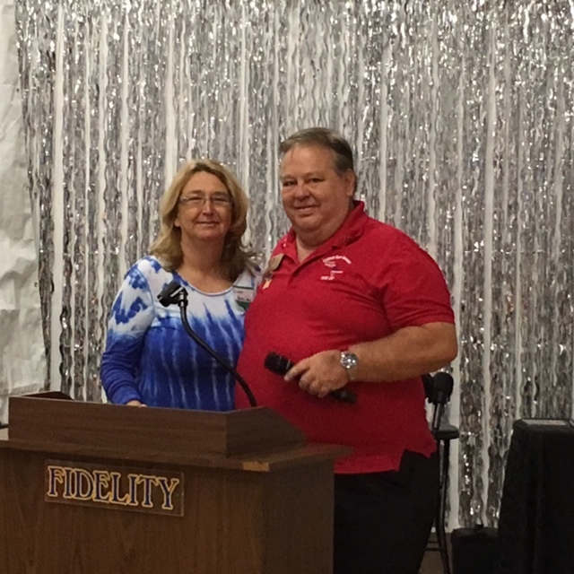 Linda Craig, the head of Manasota Operation Troop Support, is introduced as the guest speaker at the Elks Lodge 2855 by Jack Ogren, the Elks veterans chairman.