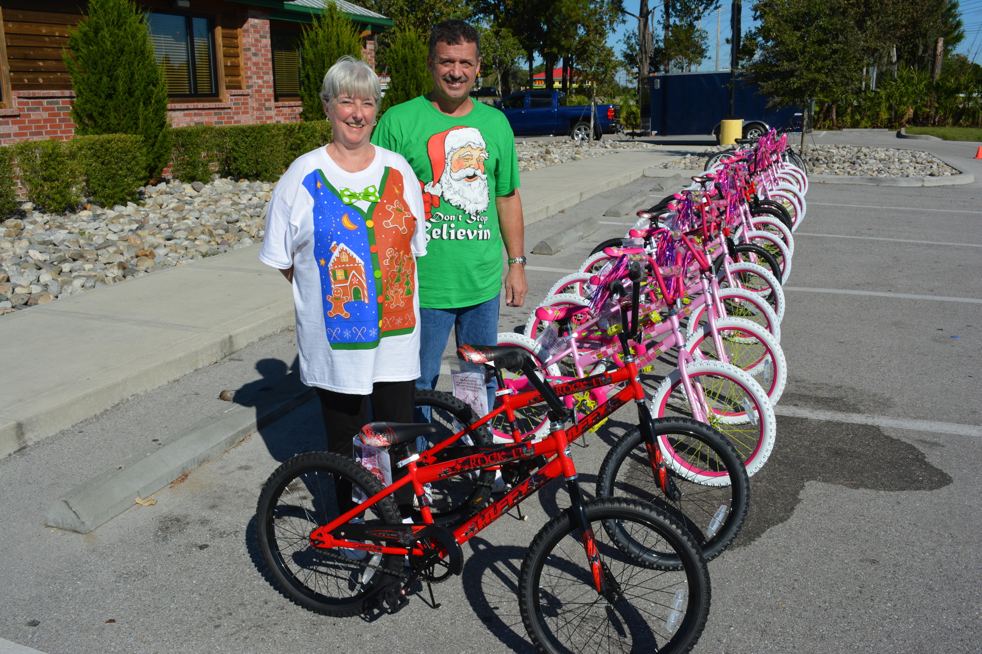 Lakewood Ranch's Maureen and Tim Hyden stand in front of the 20 bicycles they donated to kids in the 