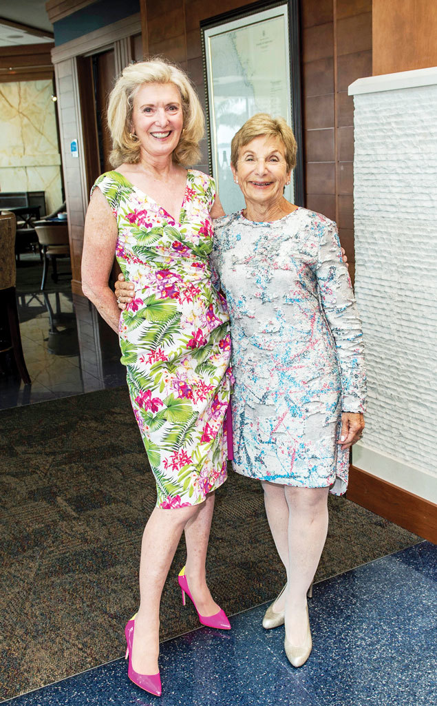 Hostesses Anne Virag and Marilyn Shuman attired for their u201cSpring Flingu201d thank you luncheon. Photo by Cliff Roles.
