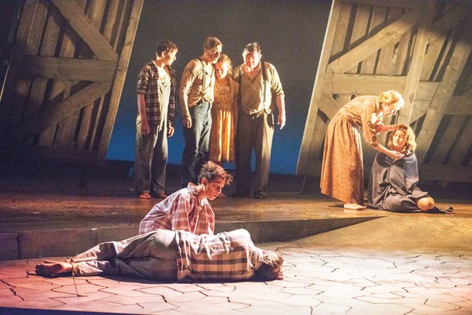 Stevie Lee Romero appears in the last scene of “The Grapes of Wrath” to ask the Joad family seeking shelter from a flood for help and food for his dying father. Photo by Cliff Roles.